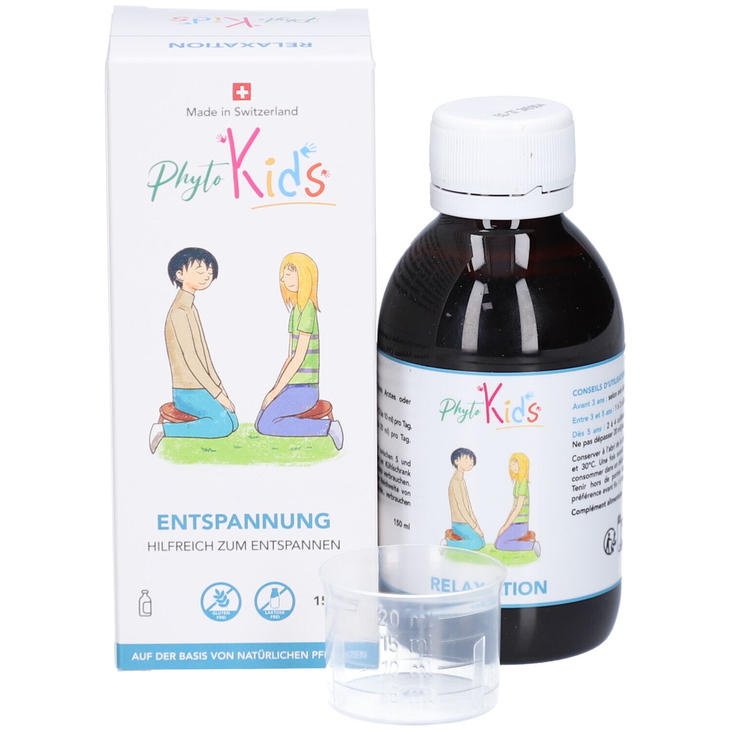 Produktverpackung mit Flasche, Messbecher und Karton. Karton mit PhytoKids-Logo, zwei Kindern und Schriftzug Entspannung.
