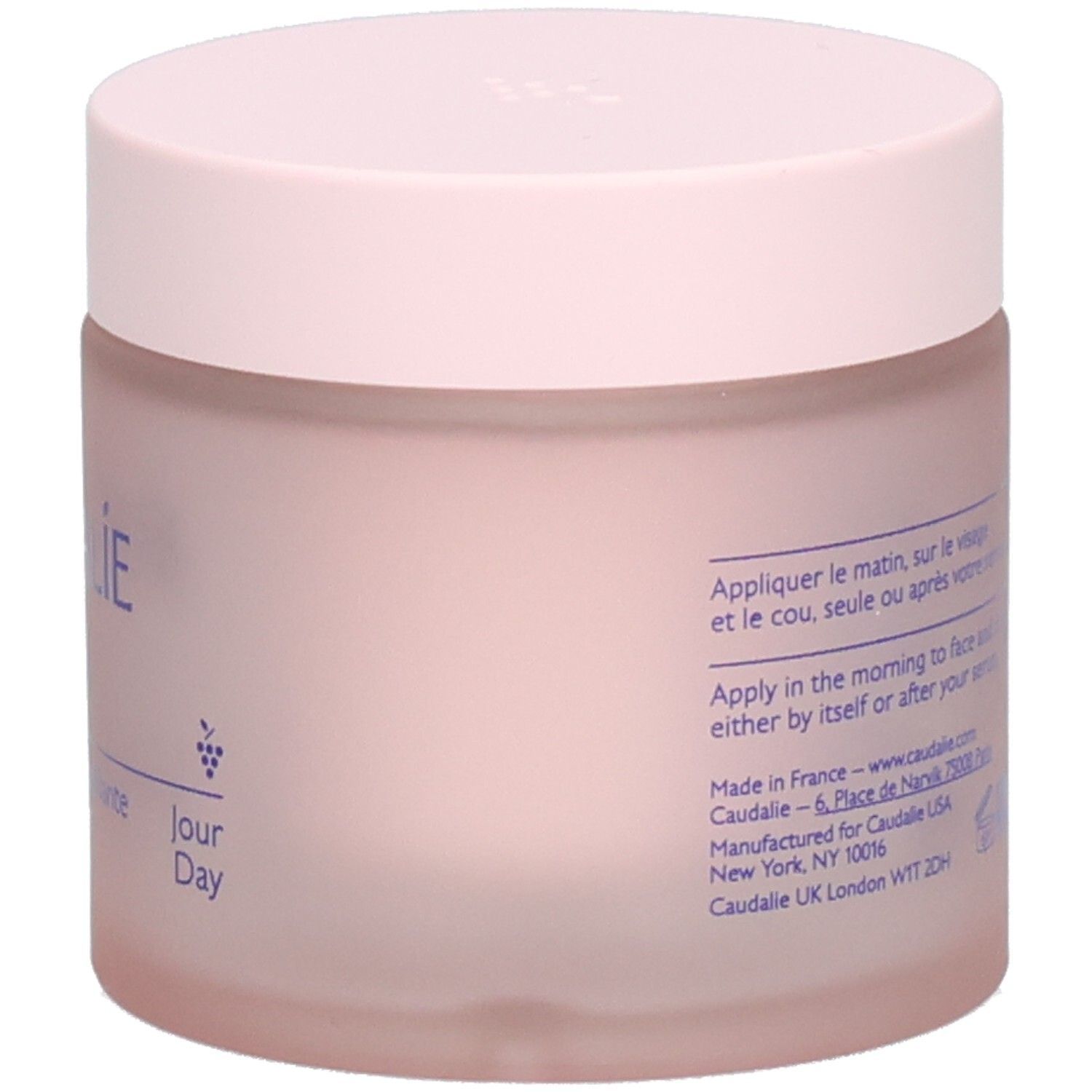 Pot de crème rose avec couvercle. Inscription: Caudalie, Resveratrol-Lift, Crème Cachemire Redensifiante. Texte au dos.