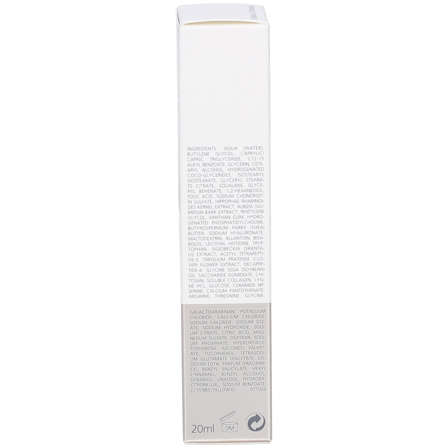 Côté de l'emballage du produit. Texte en plusieurs langues. Nom et marque visibles.