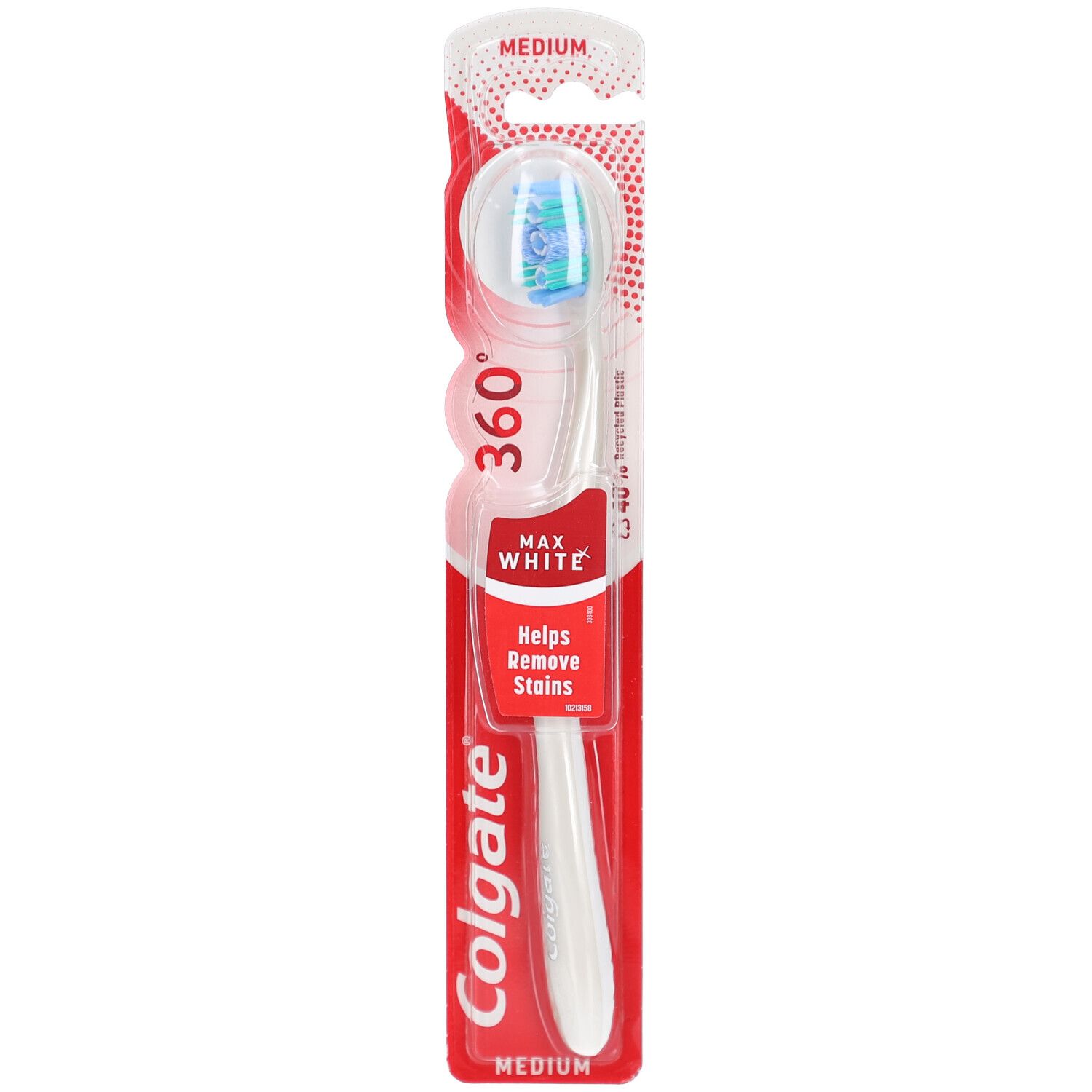 Brosse à dents blanche avec manche transparent et tête de brosse. Emballage rouge avec nom du produit et "MEDIUM".