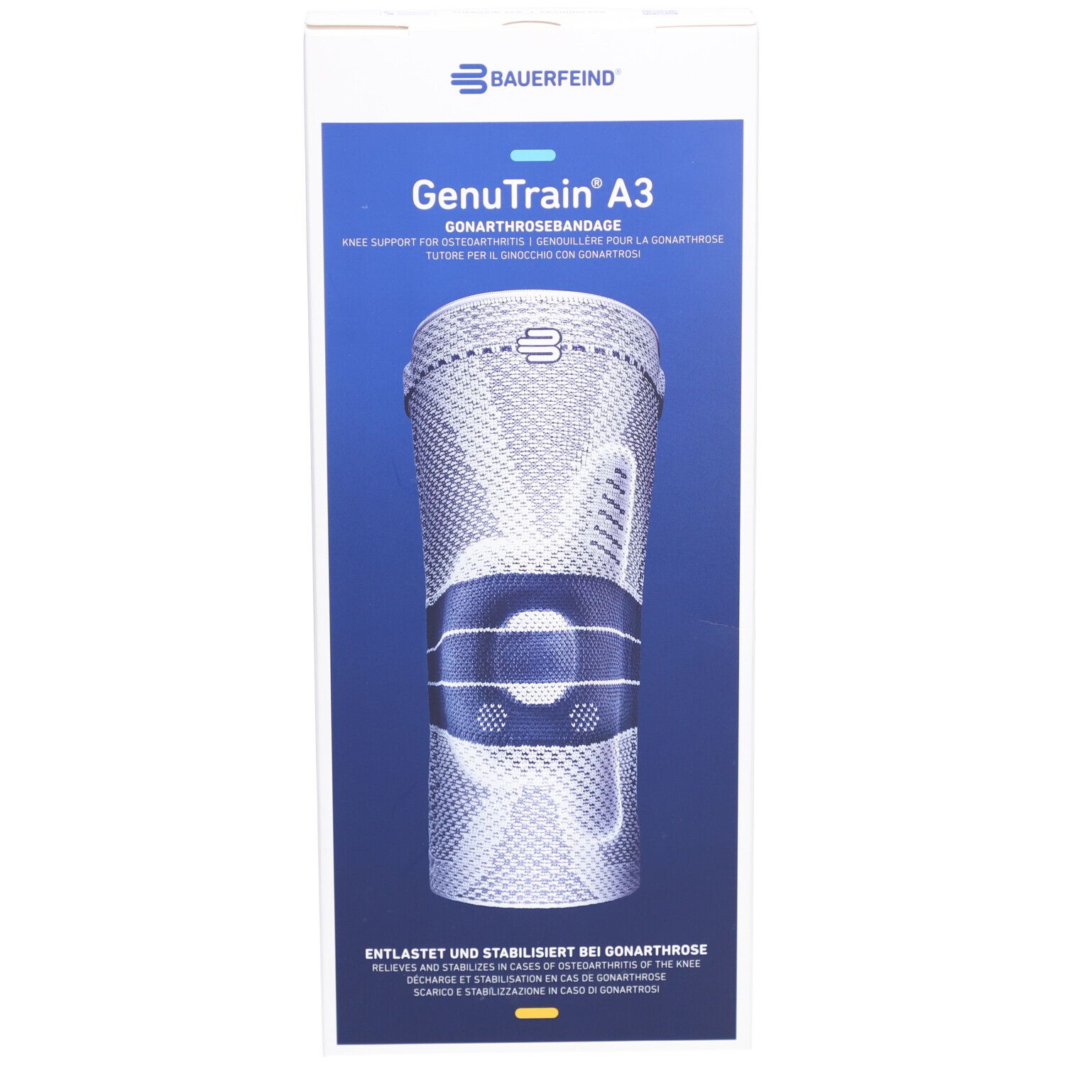 Kniebandage in Verpackung. Marke Bauerfeind, Modell GenuTrain A3. Weiß-blaue Bandage mit Details. Text: Gonarthrosebandage.