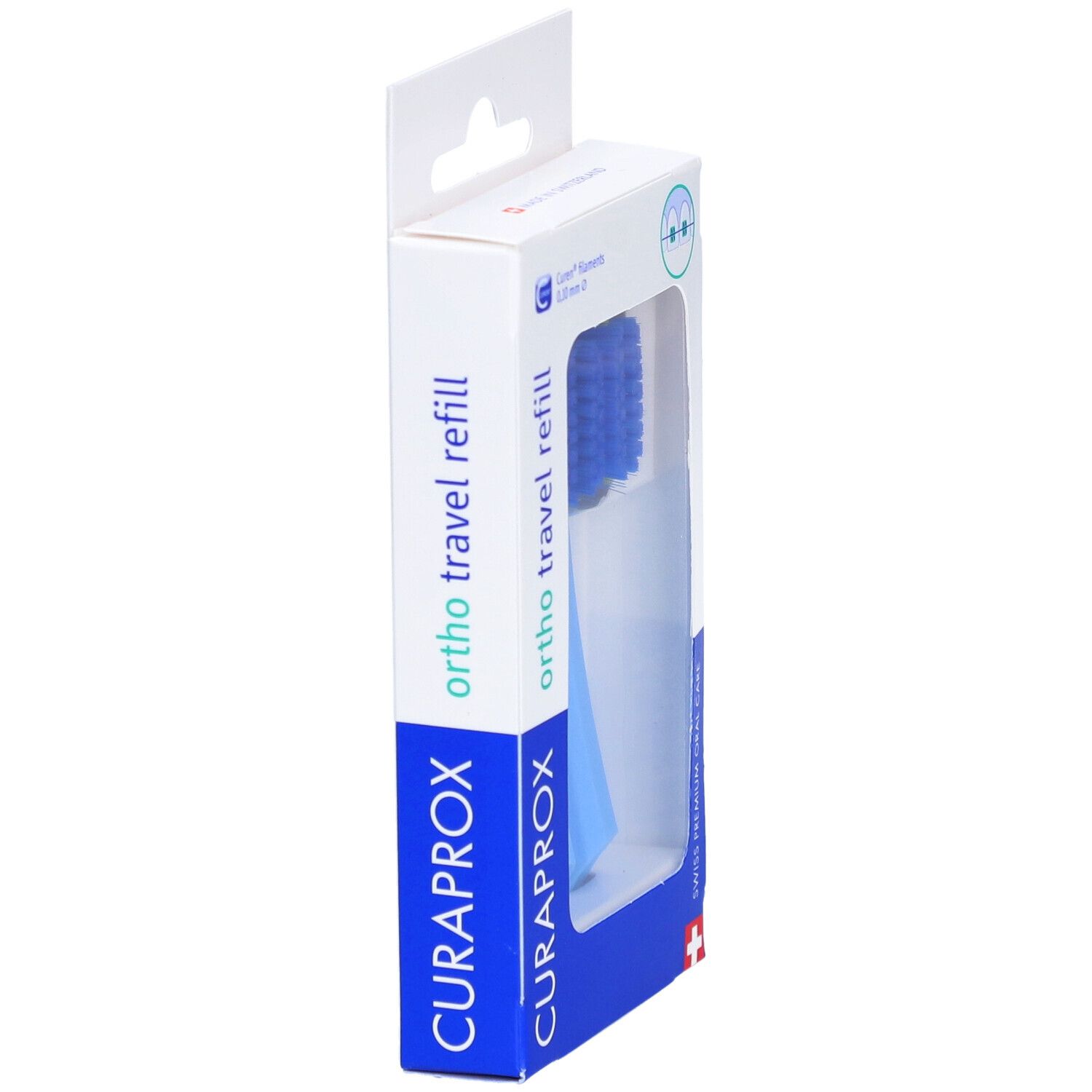 Verpackung mit einem blauen Zahnbürstenkopf. Aufdruck: CURAPROX, ortho travel refill. Sichtfenster.