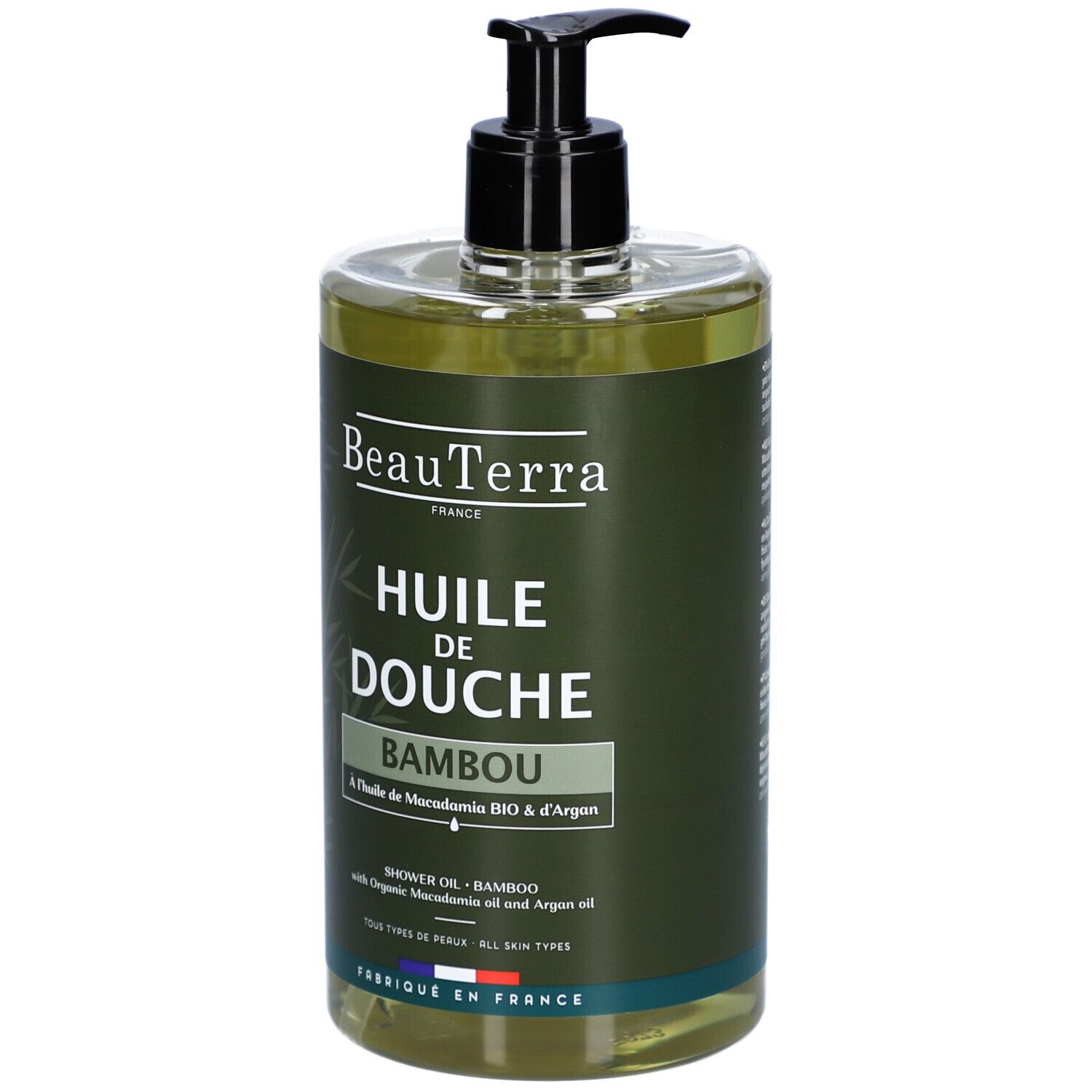 Flacon avec pompe noire. Inscription: BeauTerra, Huile de Douche Bambou. Drapeau français.