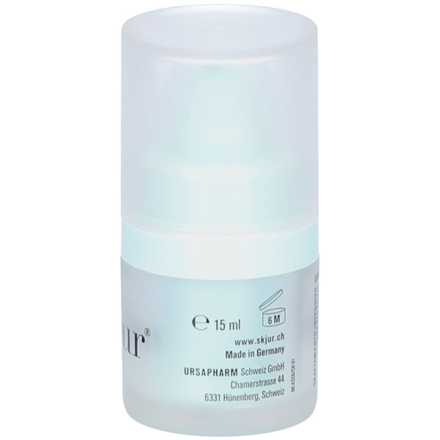 Flacon cylindrique avec bouchon. Inscription: skjur, e 15 ml. Emballage bleu clair transparent. Made in Germany.