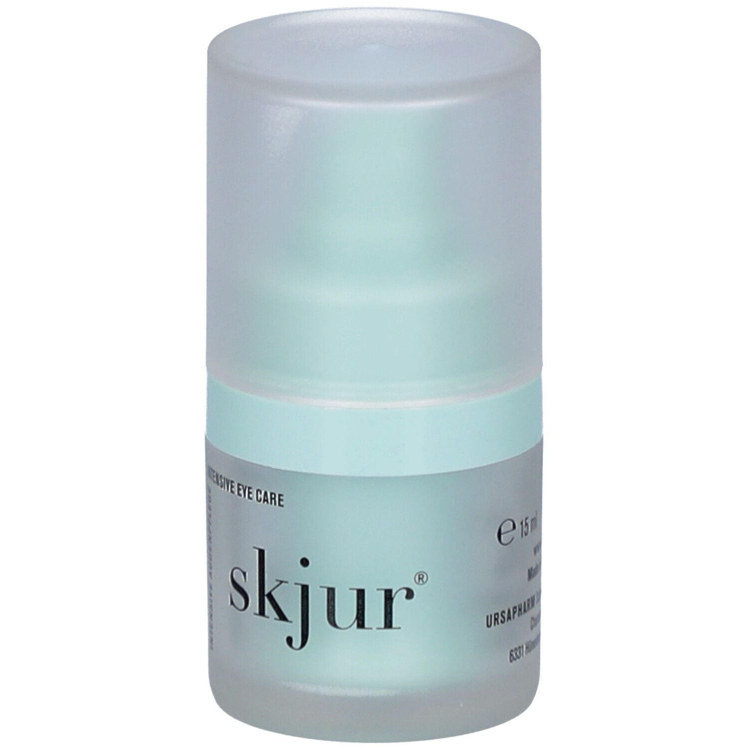 Flacon cylindrique avec bouchon. Inscription: skjur, e 15 ml. Emballage bleu clair transparent.