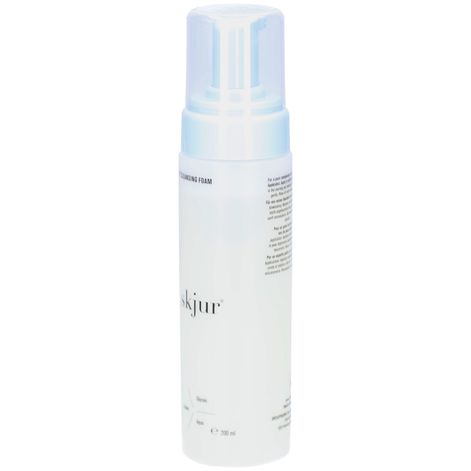 Flacon blanc avec pompe bleue. Inscription: skjur. Texte: Soft Cleansing Foam, Mousse nettoyante douce.