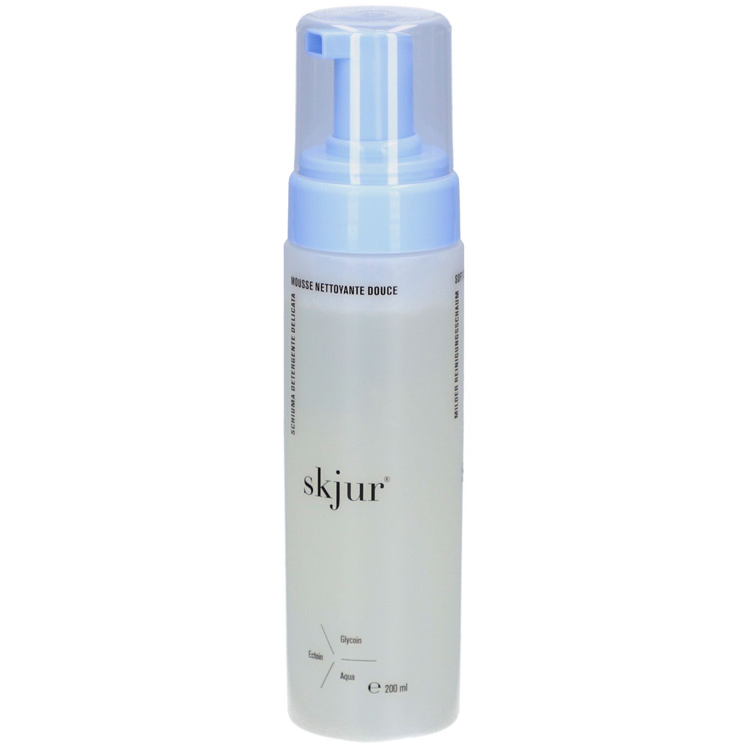 Flacon blanc avec pompe bleue. Inscription: skjur. Texte: Mousse nettoyante douce, Schiuma detergente delicata.