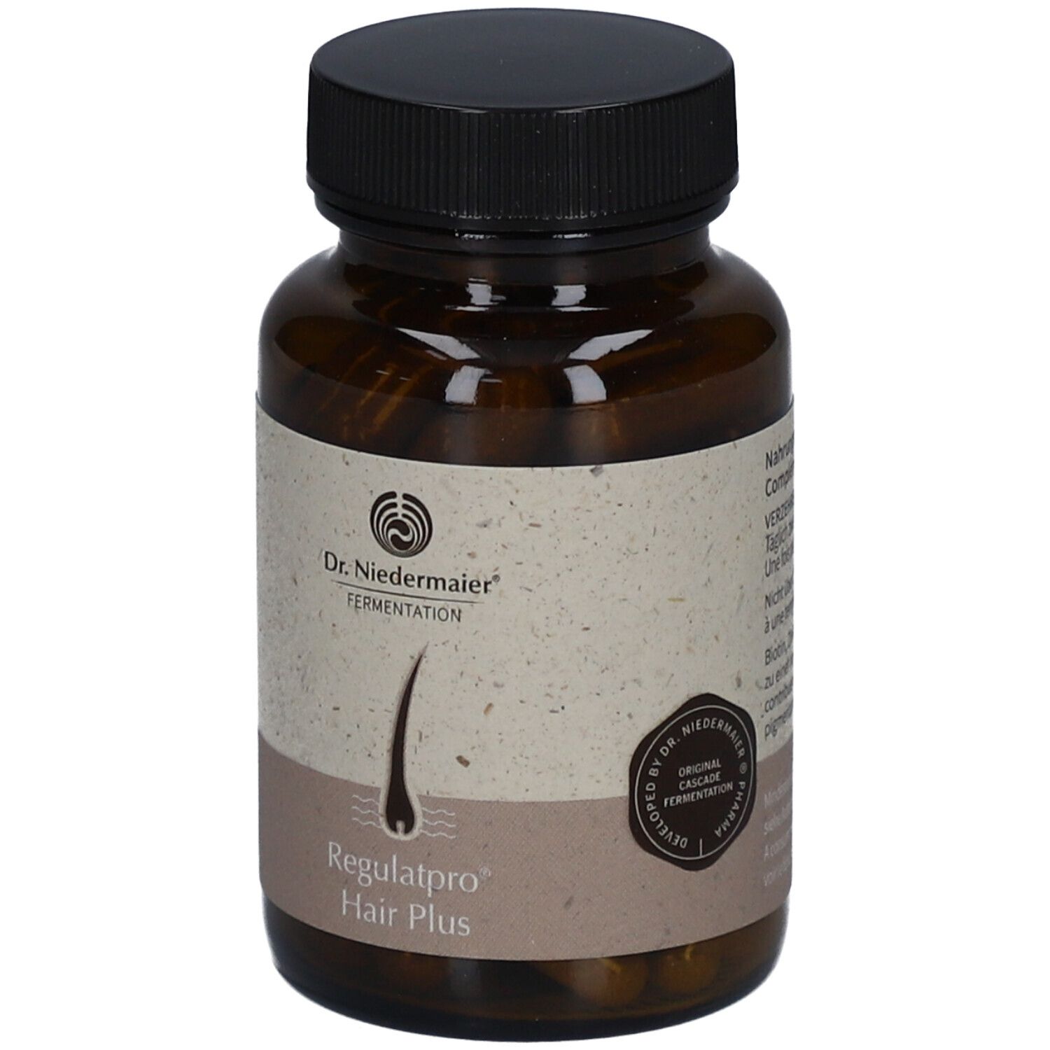 Flacon brun avec bouchon noir. Étiquette avec logo, nom du produit et symbole de cheveux.