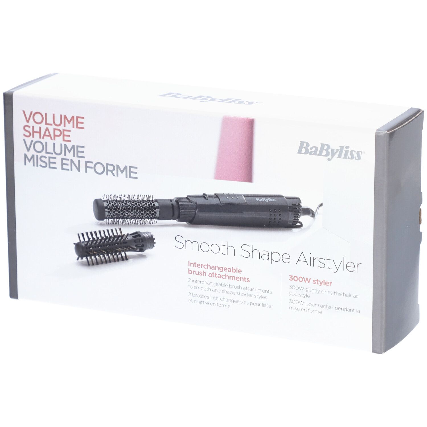 Boîte avec Airstyler et deux accessoires brosse. Marque: BaByliss. Texte: Volume Shape Mise en Forme.