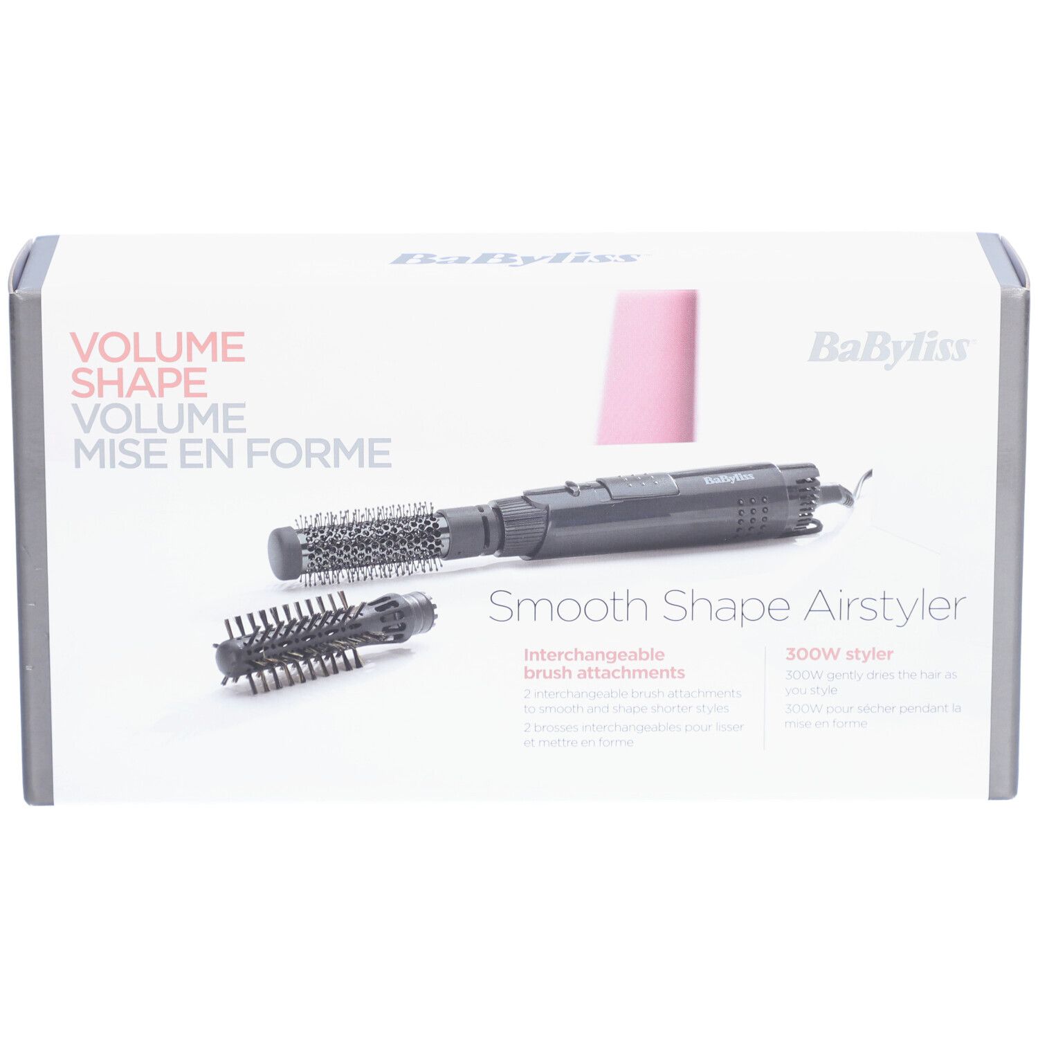 Boîte avec Airstyler et deux accessoires brosse. Marque: BaByliss. Texte: Volume Shape Mise en Forme.