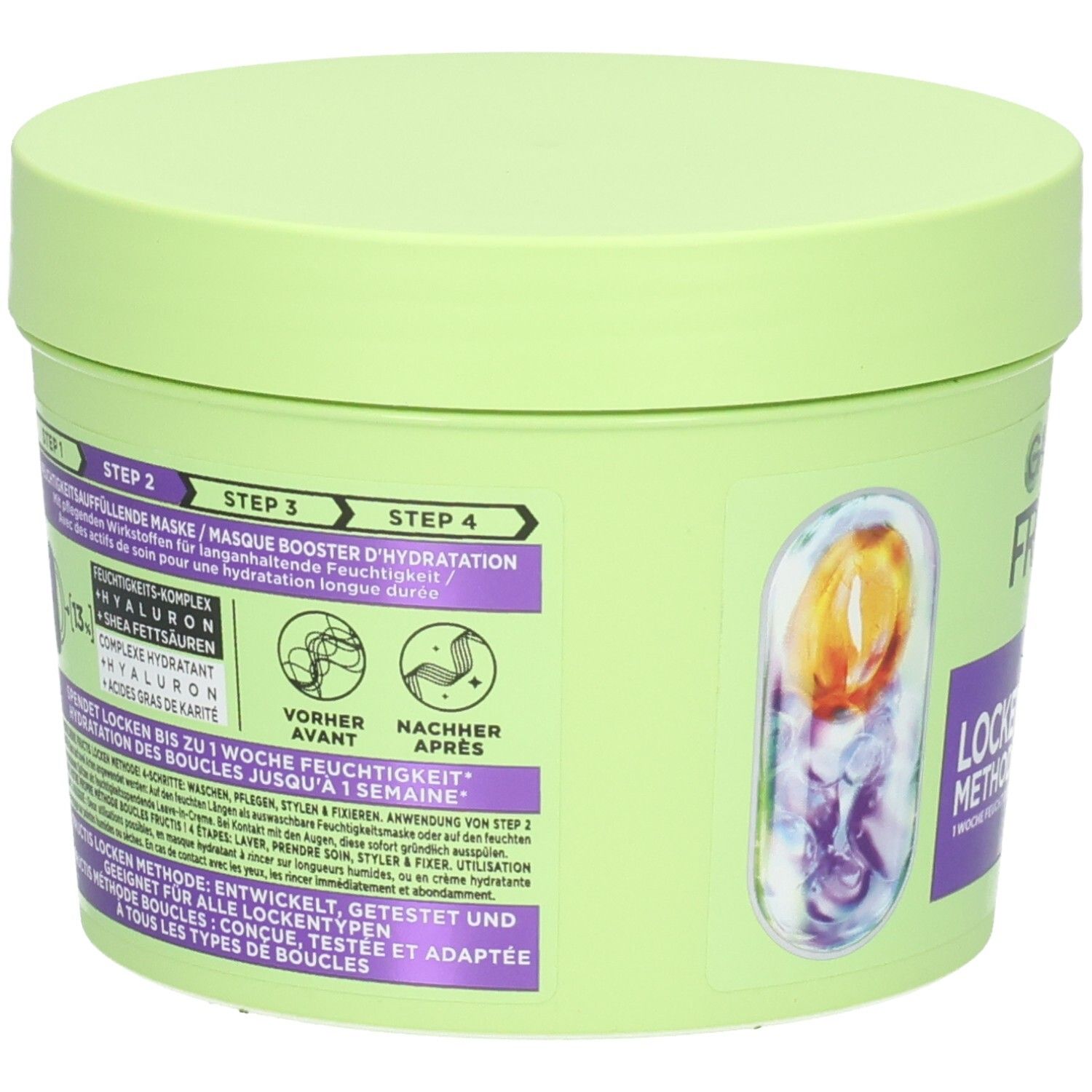 Rückseite des grünen Tiegels. Text: GARNIER FRUCTIS, Locken Methode. Enthält Hyaluron und Sheabutter. Mit Schritt-Anleitung.