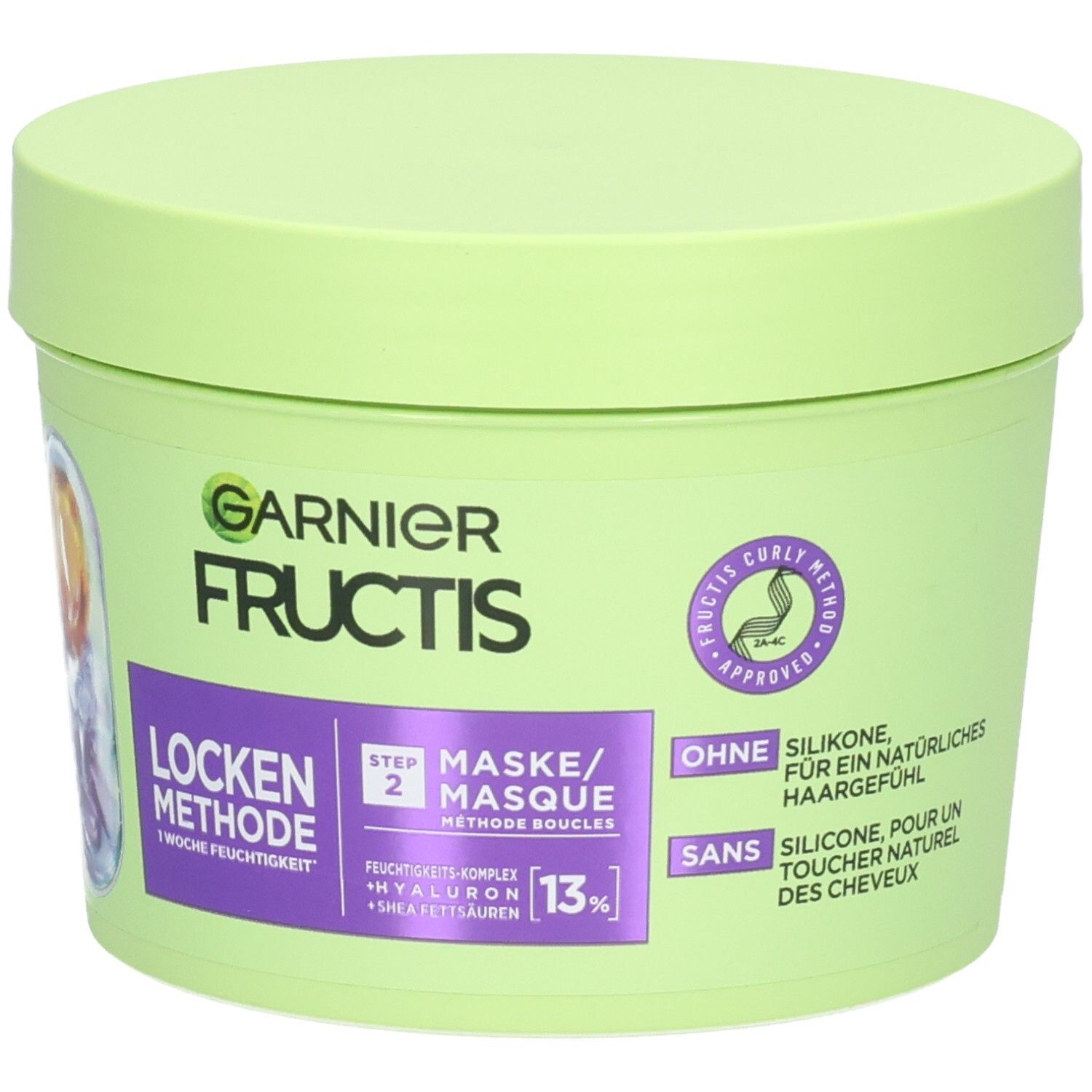 Grüner Tiegel mit Deckel. Aufschrift: GARNIER FRUCTIS, Locken Methode, Step 2 Maske. Ohne Silikone.
