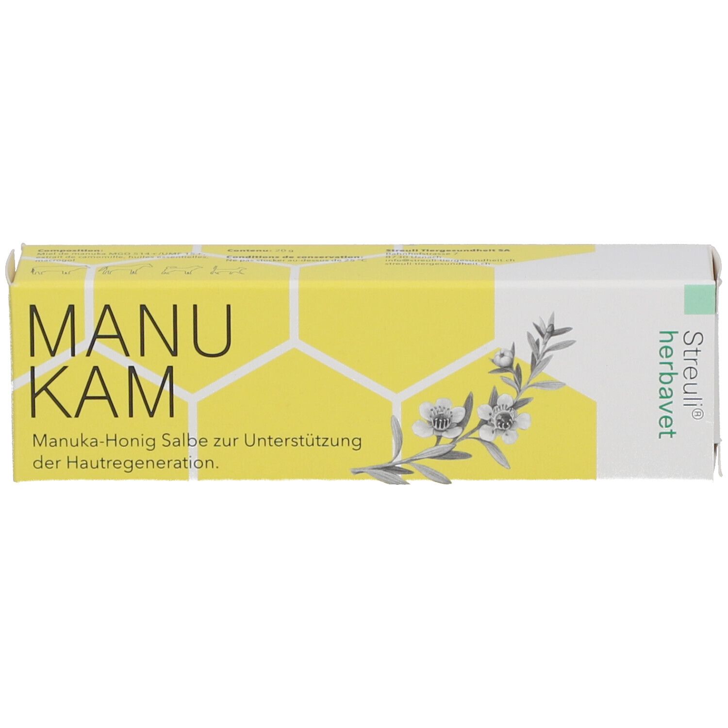 Schachtel. Aufdruck: MANU KAM, Manuka-Honig Salbe. Logo: Streuli herbavet.
