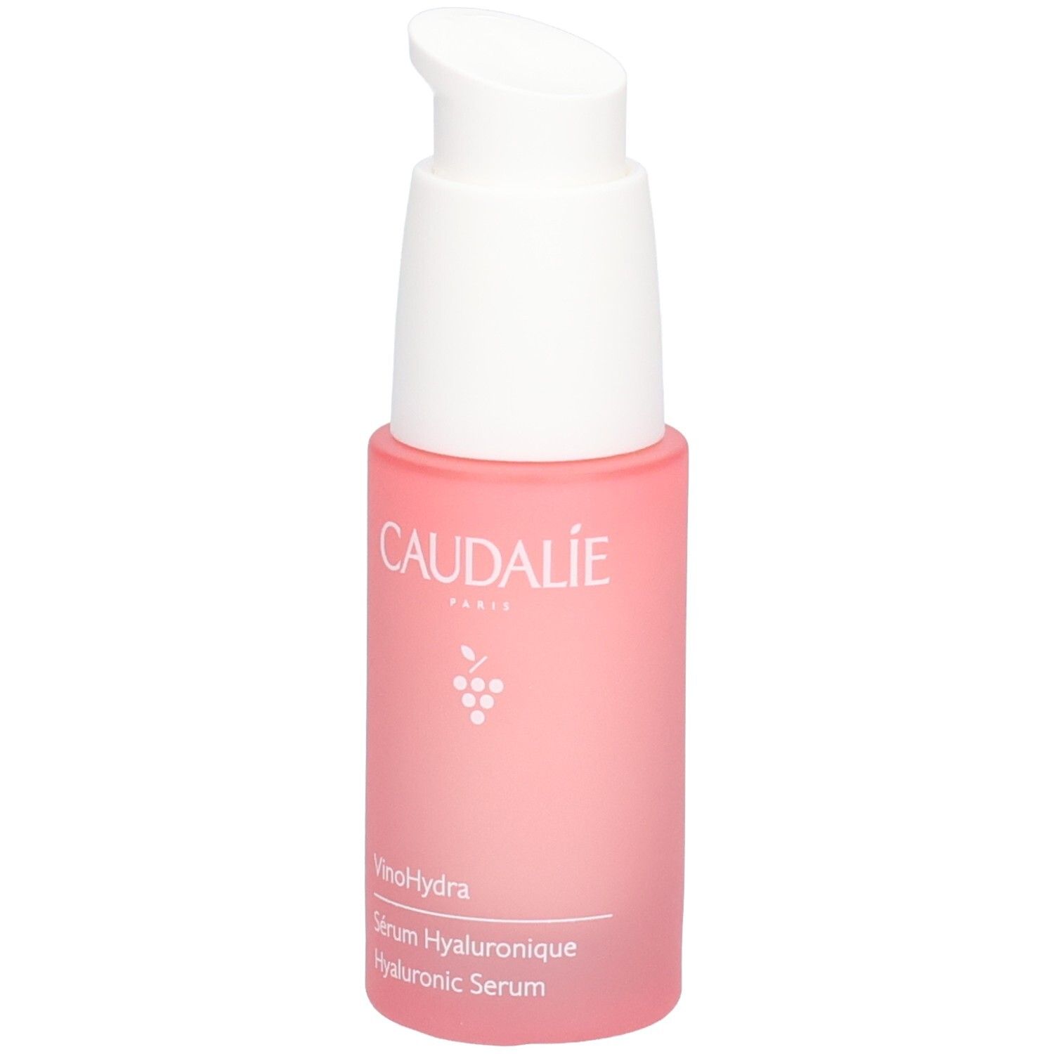 Flacon rose avec pompe blanche. Logo Caudalie et nom du produit visibles. Contient de l'acide hyaluronique.