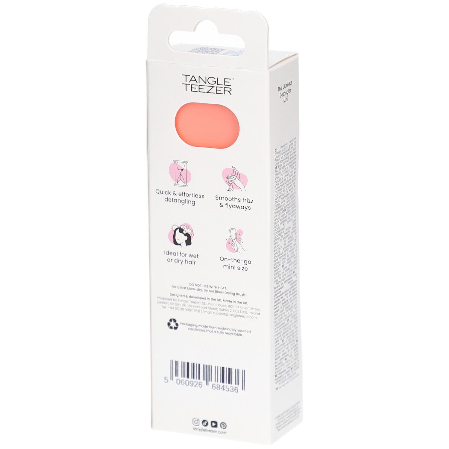 Dos de l'emballage TANGLE TEEZER Wet Detangler Mini. Rose et blanc. Informations sur le produit et logos.