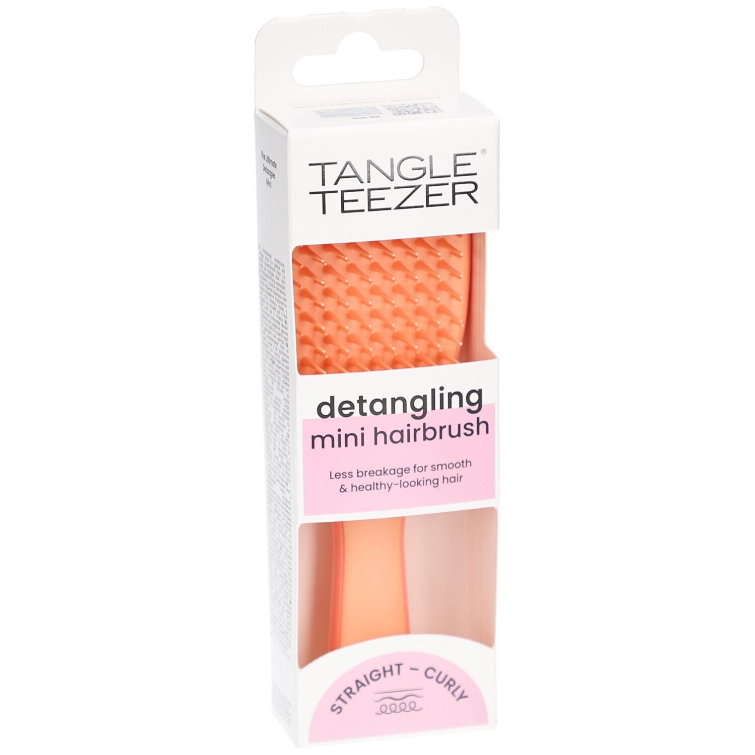 Brosse TANGLE TEEZER Wet Detangler Mini en emballage. Vue de face. Soies oranges, manche rose. Pour cheveux lisses et bouclés.