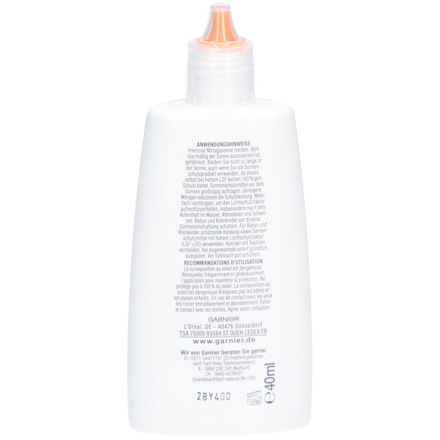 Rückseite der weißen Flasche. Text mit Anwendungs- und Gebrauchshinweisen. Garnier-Logo und Kontaktinformationen.