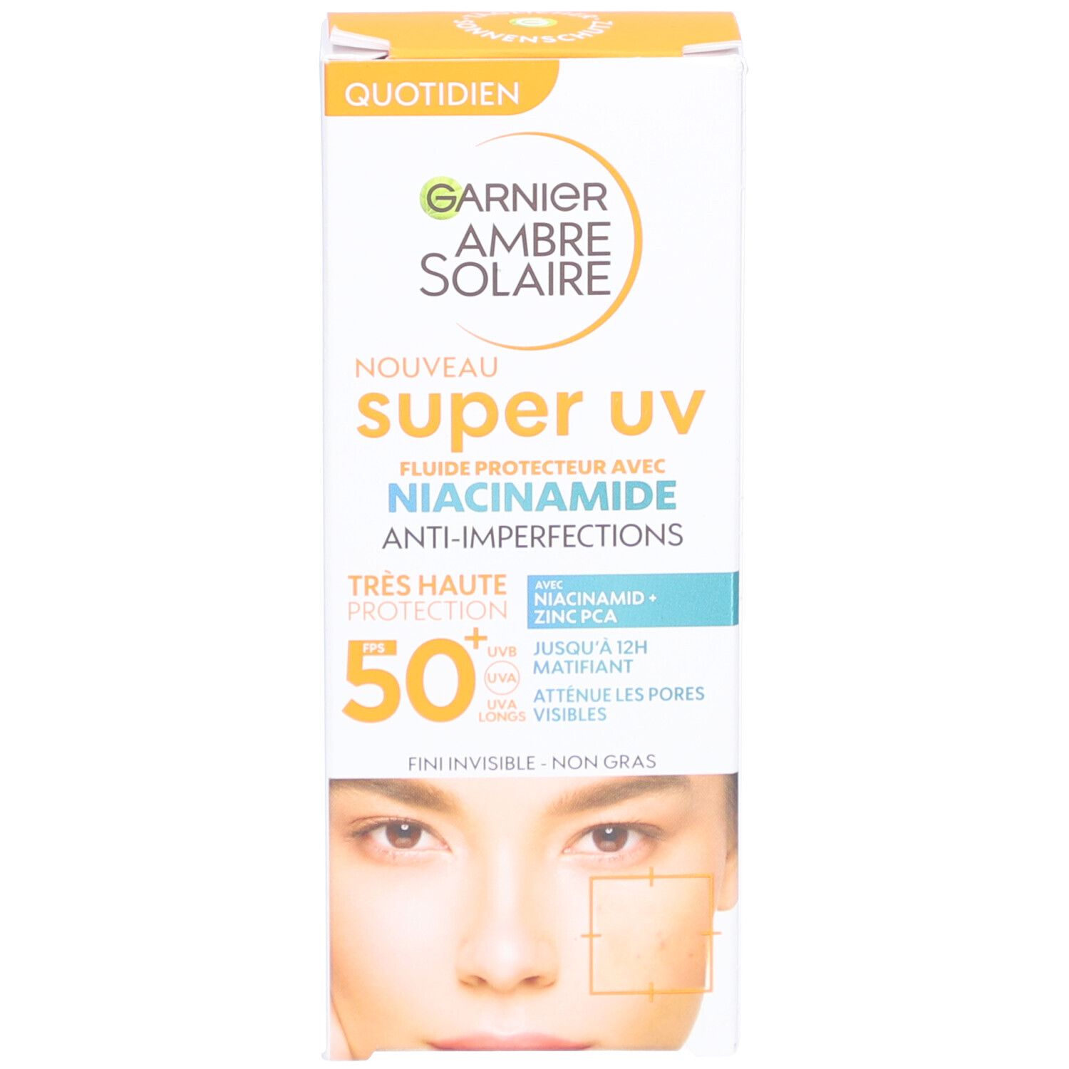 Produktverpackung. Garnier Ambre Solaire Super UV Fluid mit SPF50+ und Niacinamid. Verpackung mit Gesicht.