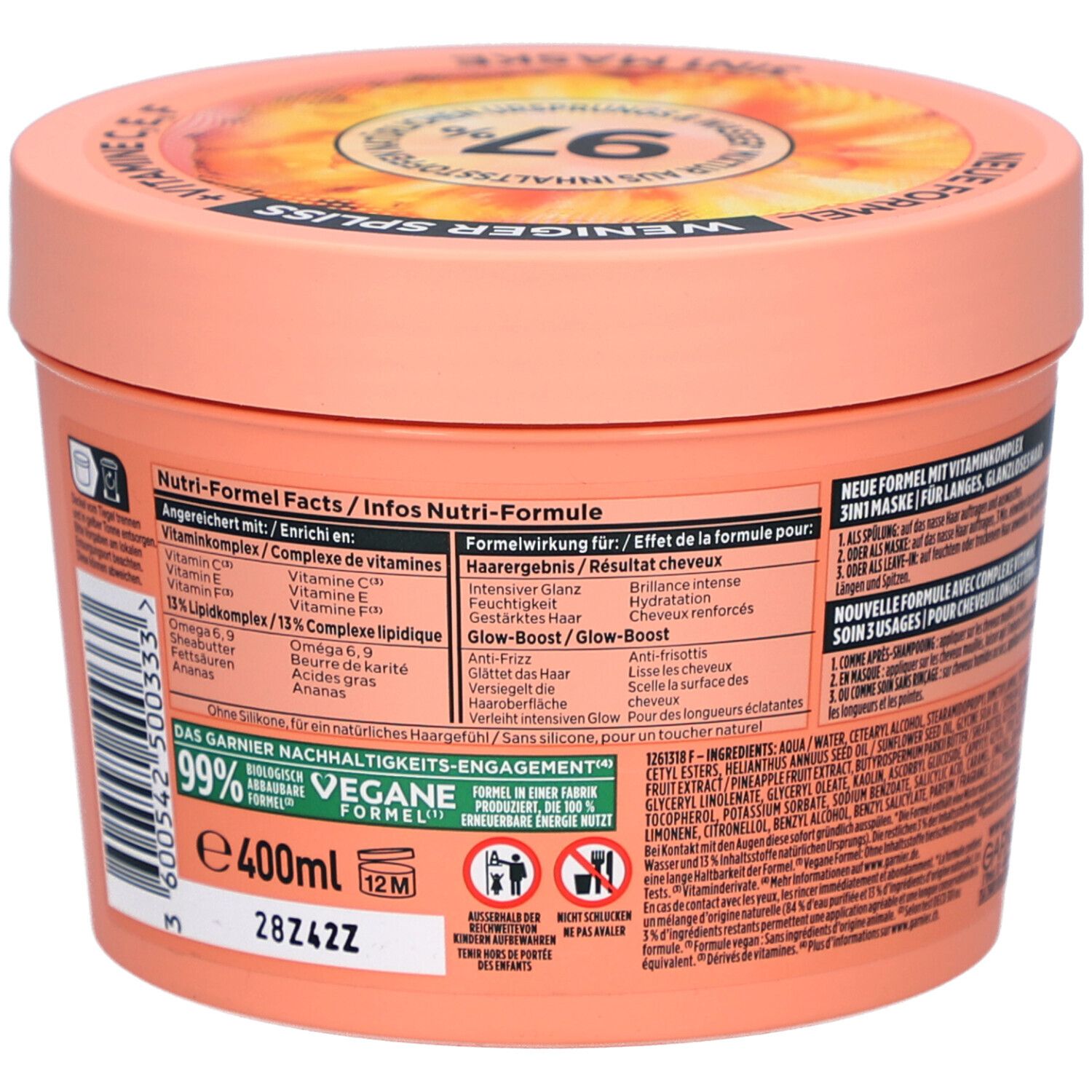 Runde Dose, Rückseite, mit Text. Garnier Fructis Hair Food Ananas. Aufschrift: 99% natürliche Inhaltsstoffe, 400ml.