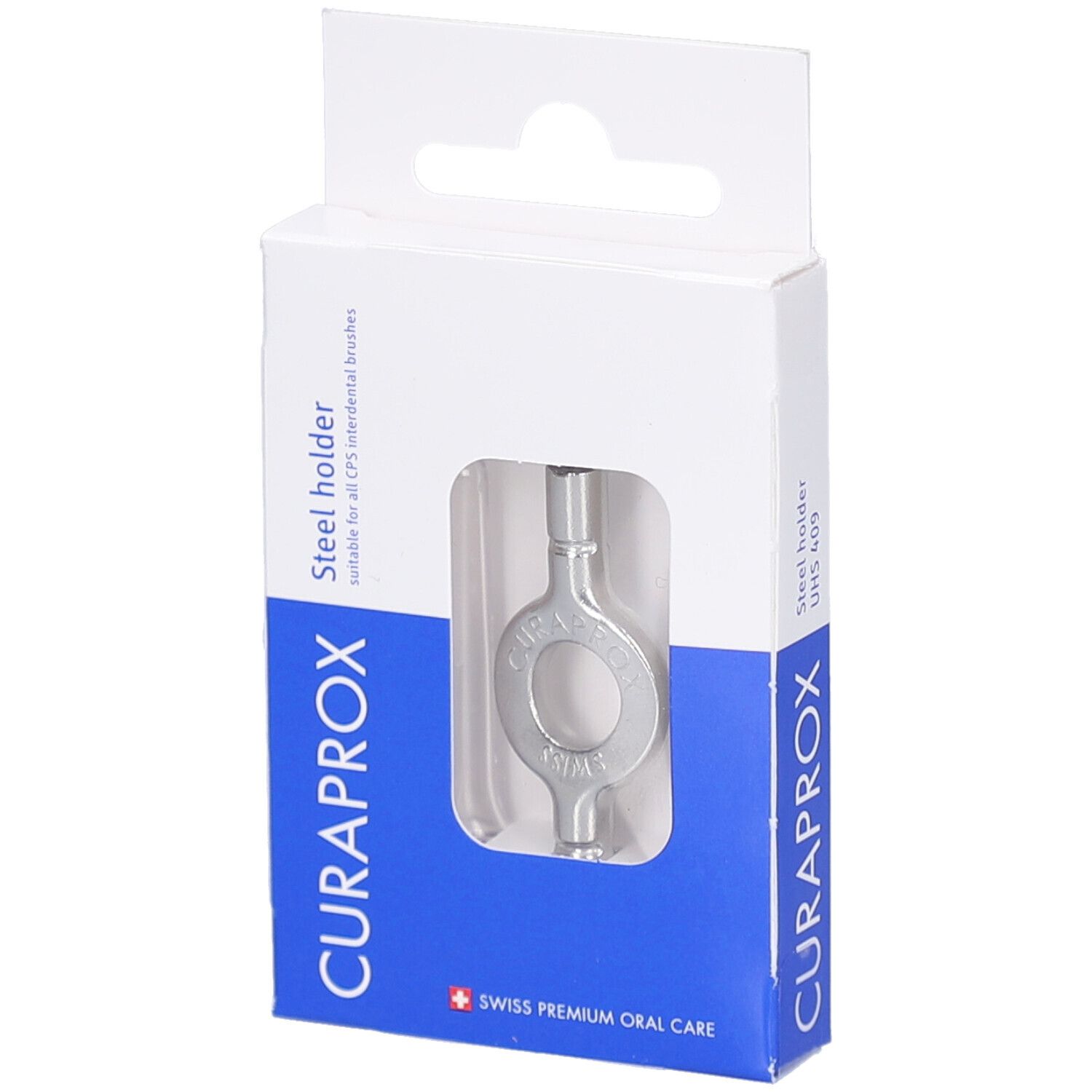 Silberfarbener Stahlhalter in weißer Verpackung mit Sichtfenster. Marke CURAPROX, Text: Steel holder.