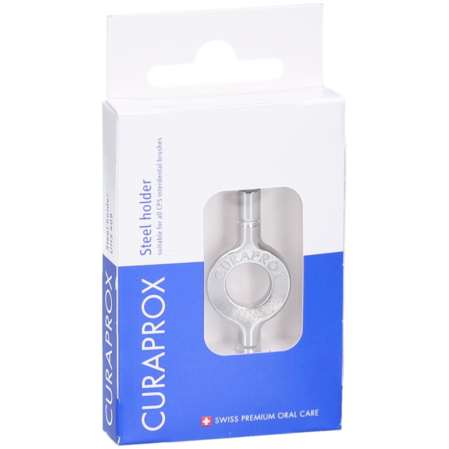 Silberfarbener Stahlhalter in weißer Verpackung mit Sichtfenster. Marke CURAPROX, Text: Steel holder.