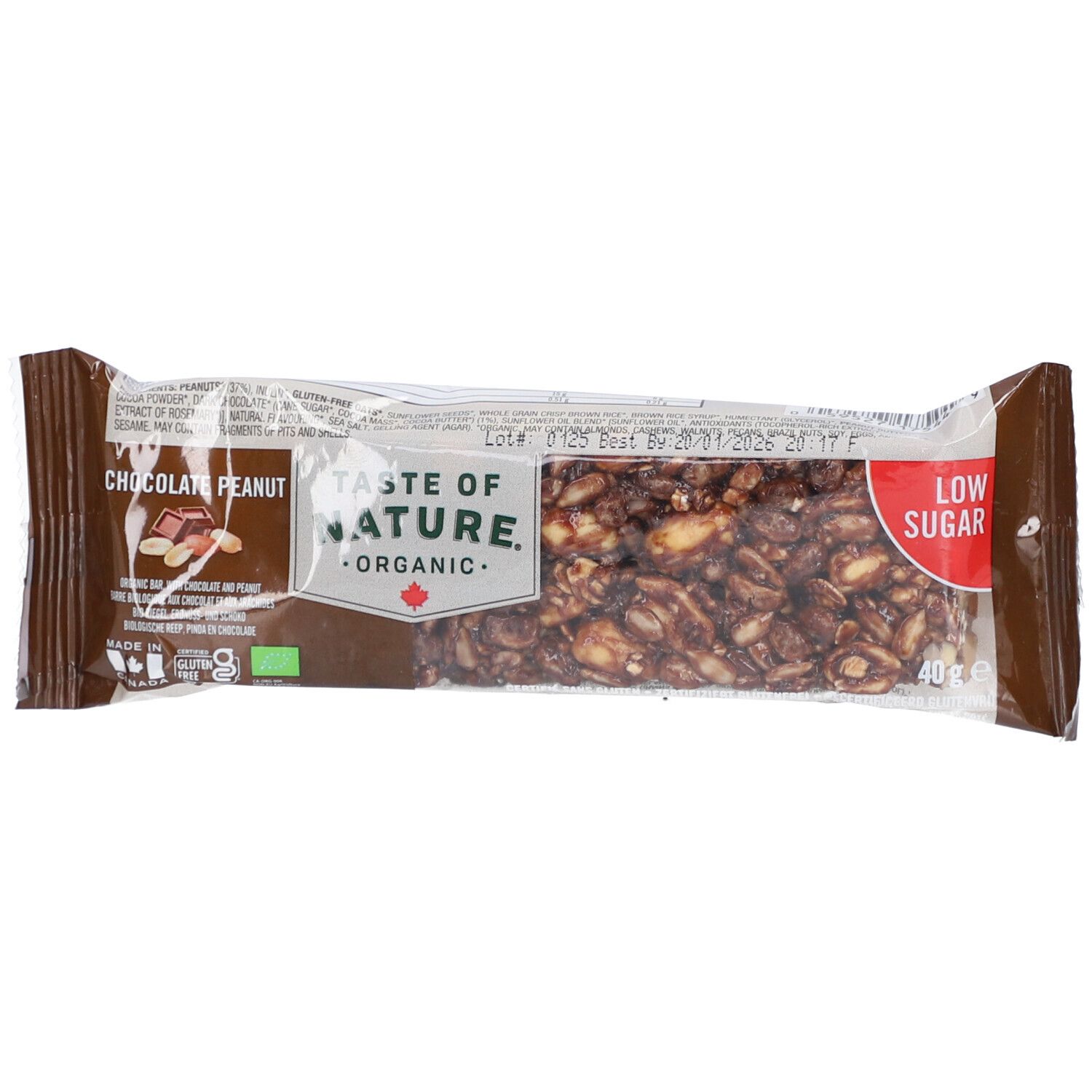 Riegel in Folienverpackung. Aufdruck: "TASTE OF NATURE ORGANIC". Text: "Chocolat Peanut". Siegel: "Low Sugar".