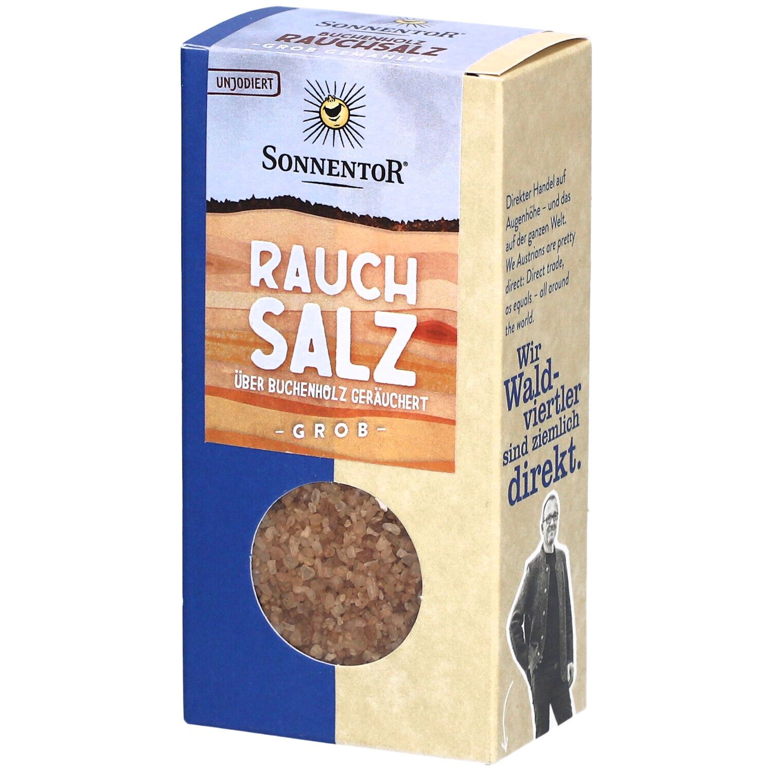 Boîte de sel fumé SONNENTOR®. Fenêtre montrant du sel grossier. Texte : Rauch Salz, fumé au bois de hêtre, grossier.