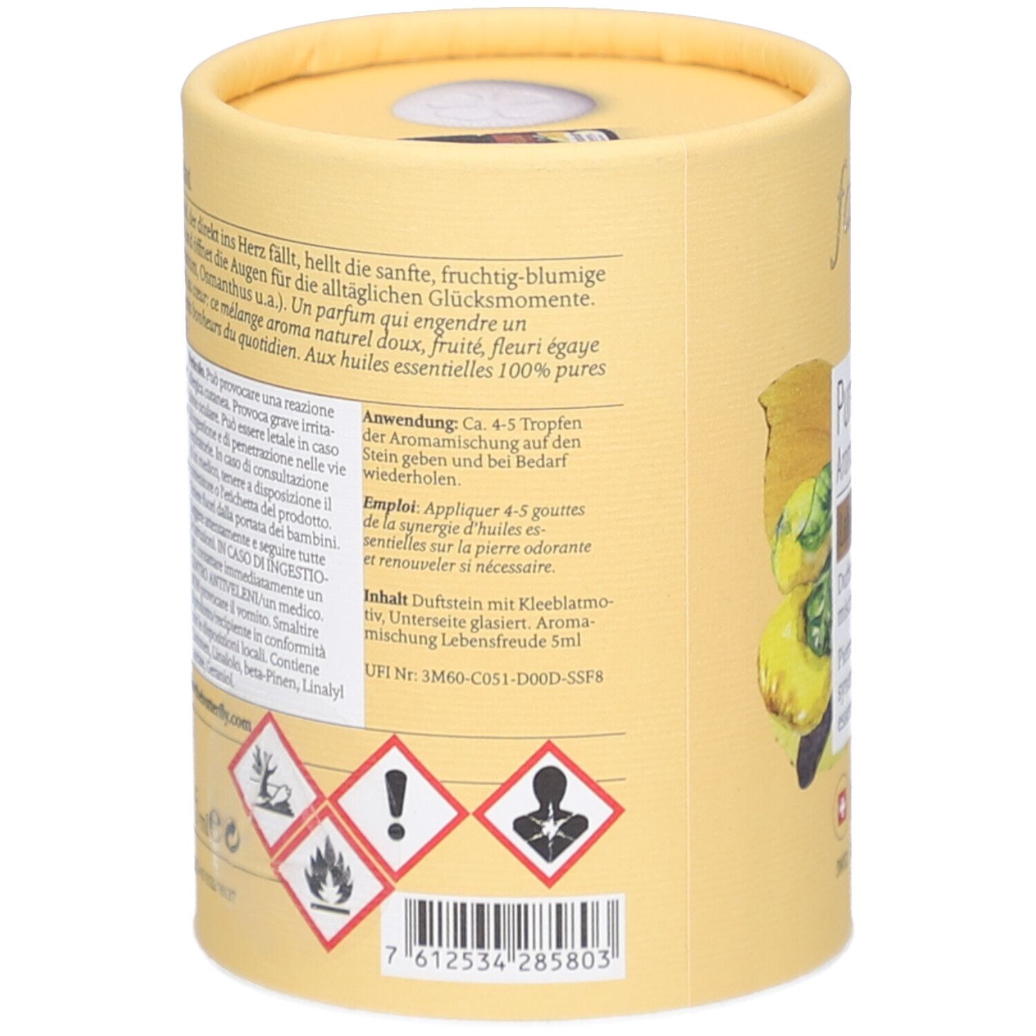 Zylindrische Verpackung, Rückseite. Text über Anwendung, Inhaltsstoffe, Gefahrenhinweise. Enthält Duftstein mit Kleeblattmotiv. UFI-Code und Barcode.