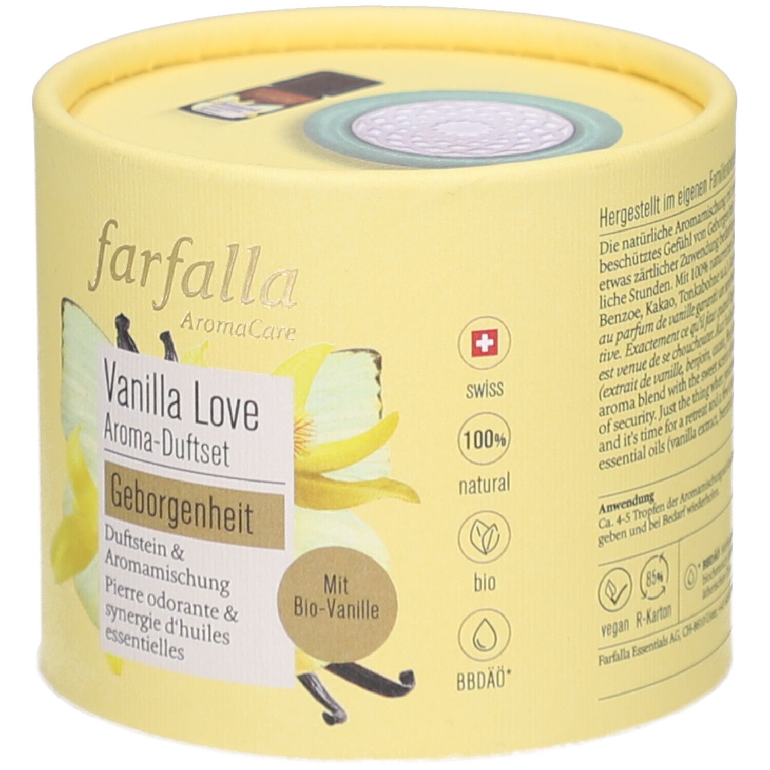 Gelbe runde Verpackung. Aufschrift: Farfalla AromaCare, Vanilla Love Aroma-Duftset, Geborgenheit. Schweizer Kreuz, Bio-Siegel.