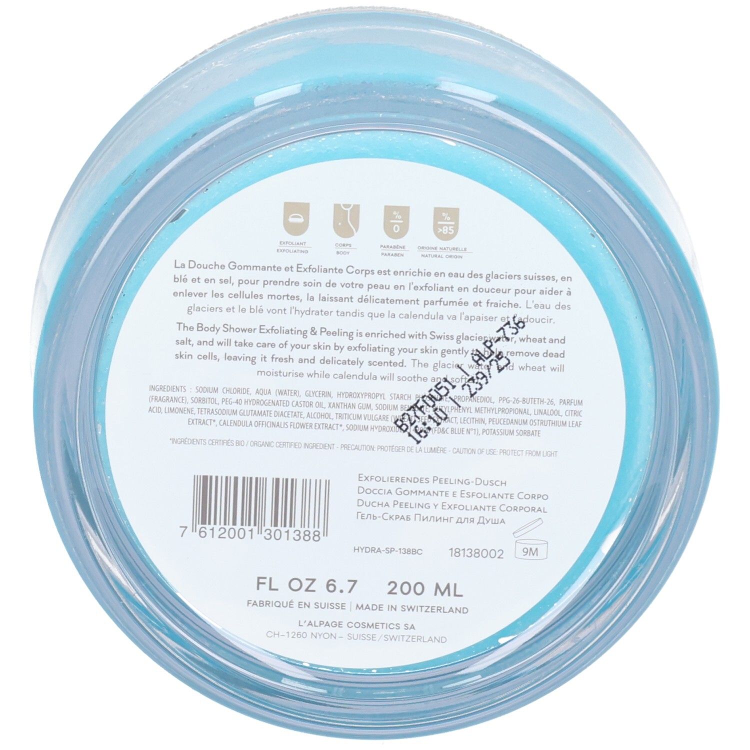 Fond d'un pot rond. Informations produit et code-barres. Texte multilingue. Liquide bleu visible.