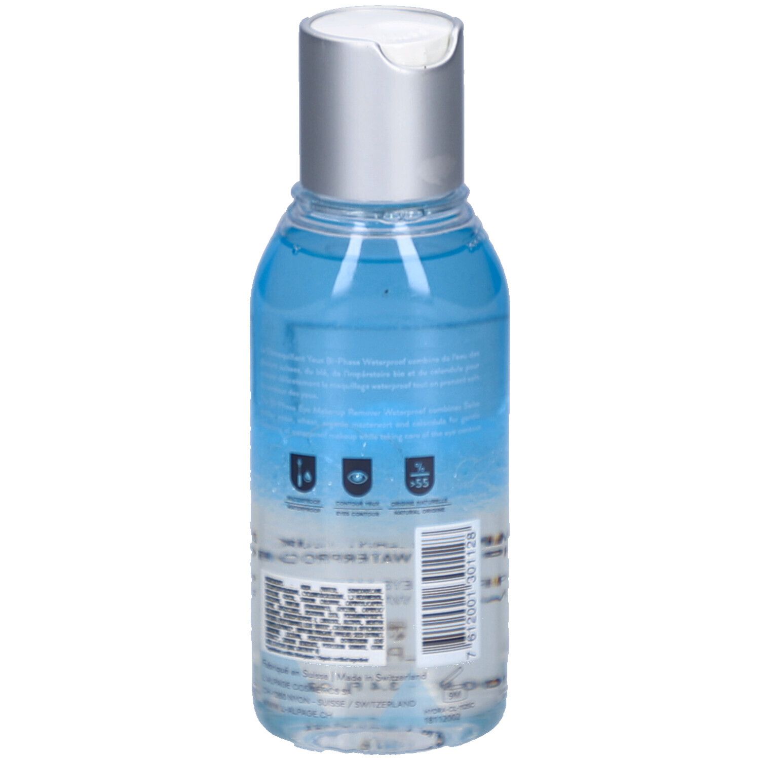 Rückansicht der Flasche mit blauem und klarem Inhalt. Silberner Deckel. Text und Symbole auf dem Etikett.