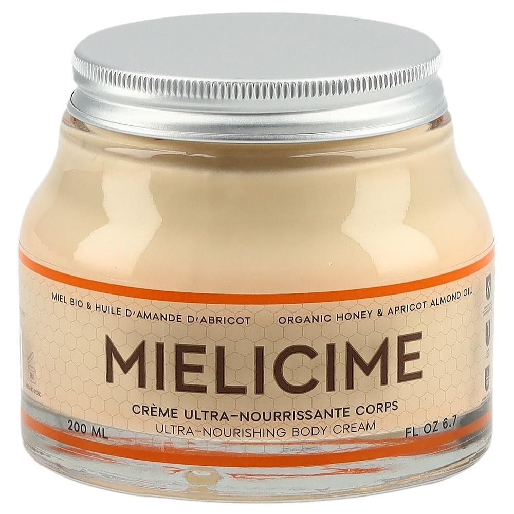 Pot en verre avec crème. Couvercle argenté. Inscription: Mielicime, Crème ultra-nourrissante corps. Huile de miel et d'abricot.
