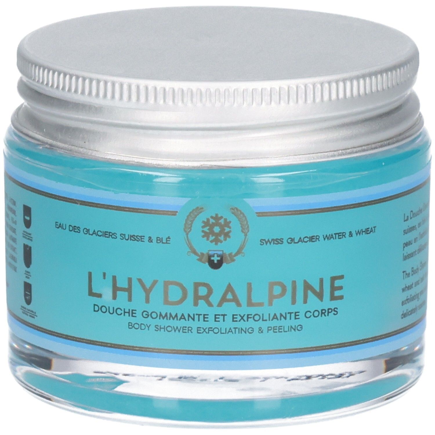 Pot avec contenu bleu et couvercle argenté. Inscription: L'Hydralpine, gommage douche.