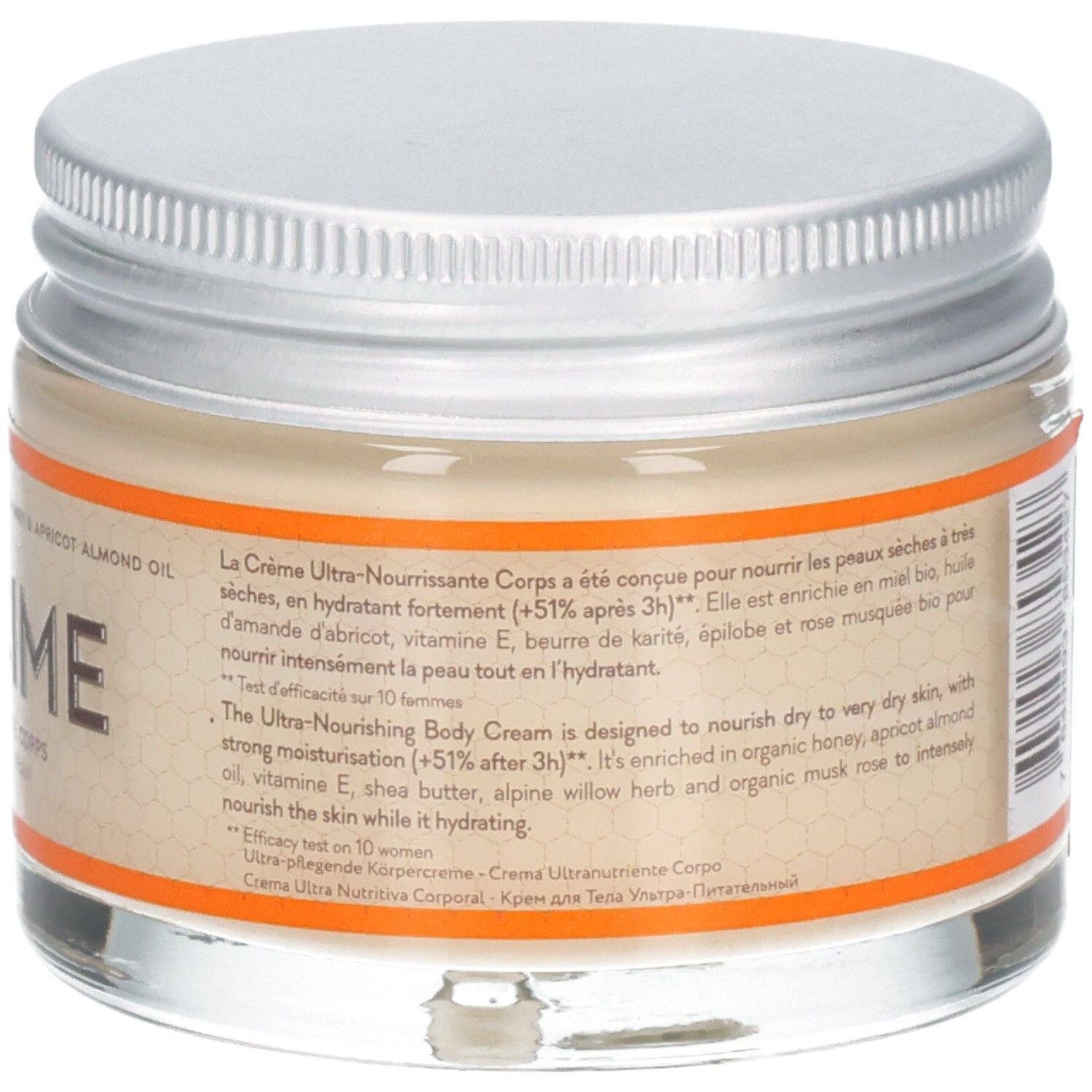 Pot en verre avec couvercle argenté. Étiquette avec texte. Bord orange. Nom du produit et texte.