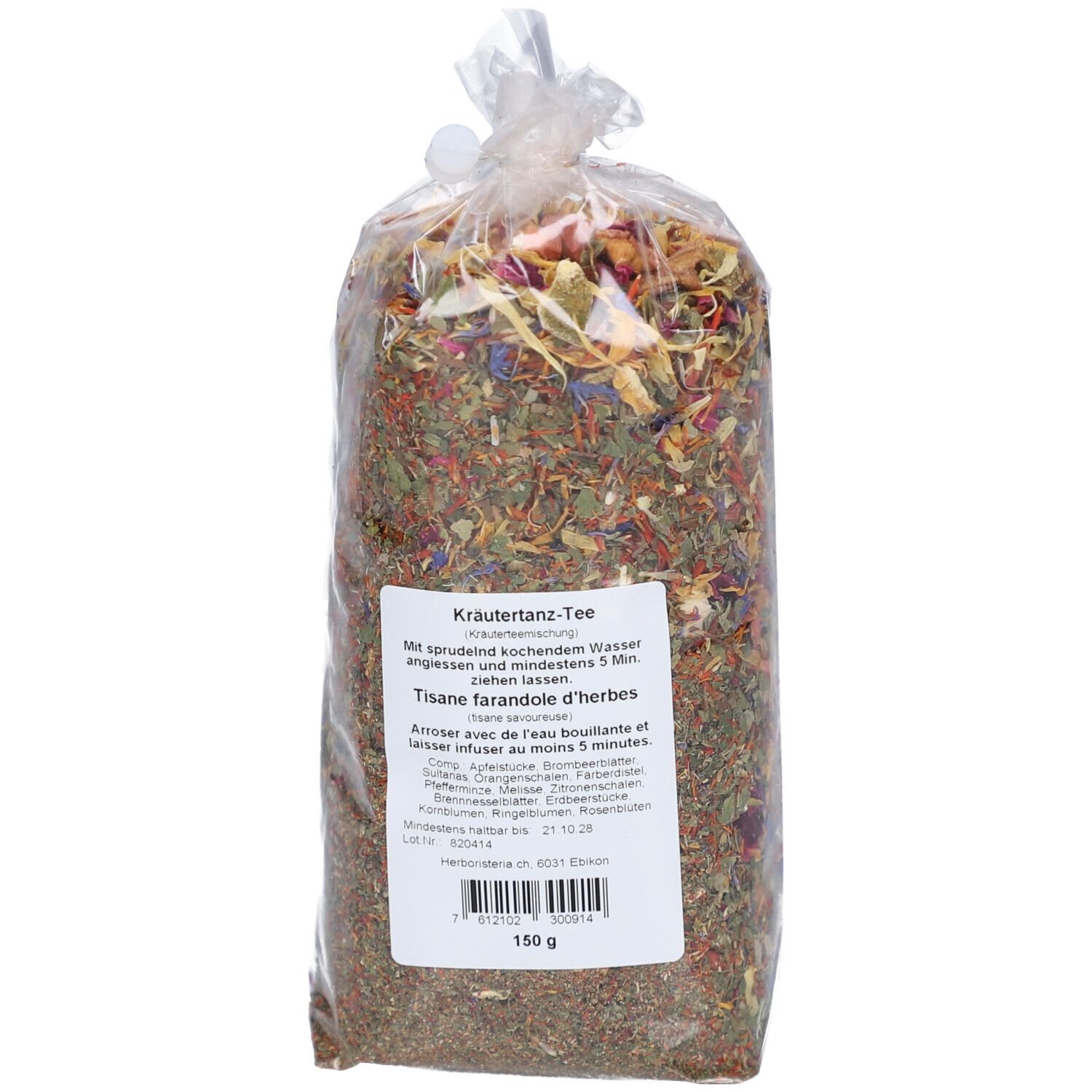 Mélange d'herbes en emballage transparent. Étiquette avec texte: Kräutertanz, 150g, Tisane farandole d'herbes.