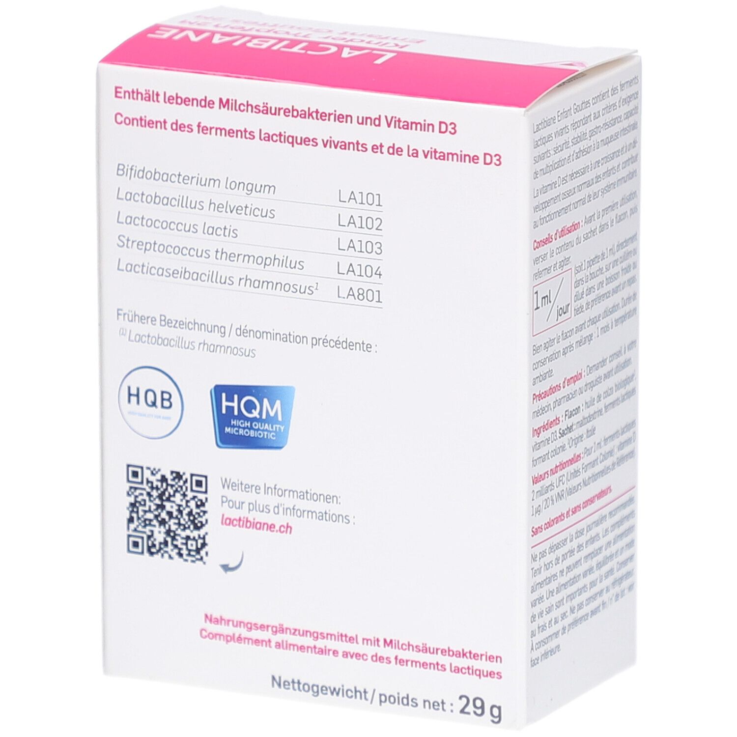 Rückseite der Schachtel. Enthält lebende Milchsäurebakterien und Vitamin D3. Auflistung der Bakterienstämme. HQM-Qualitätszeichen.