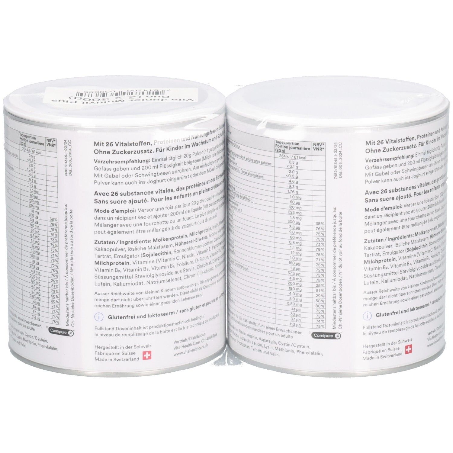 Rückseite von zwei Dosen Vita Junior Multivit Plus. Text: Nährwertangaben, Inhaltsstoffe. Weißer Deckel. 300g.