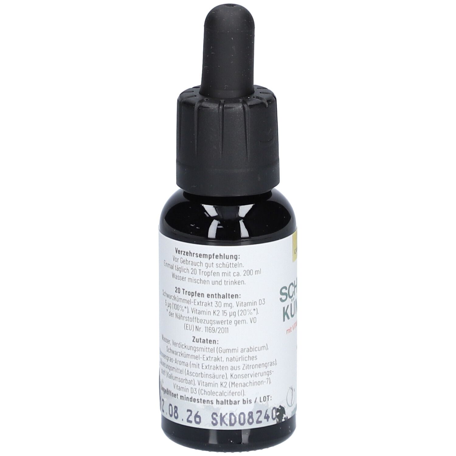 Flacon en verre brun avec compte-gouttes noir. Inscription : CANNSOL, Schwarzkümmel avec vitamine D3 et K2. Vegan. Texte au dos.