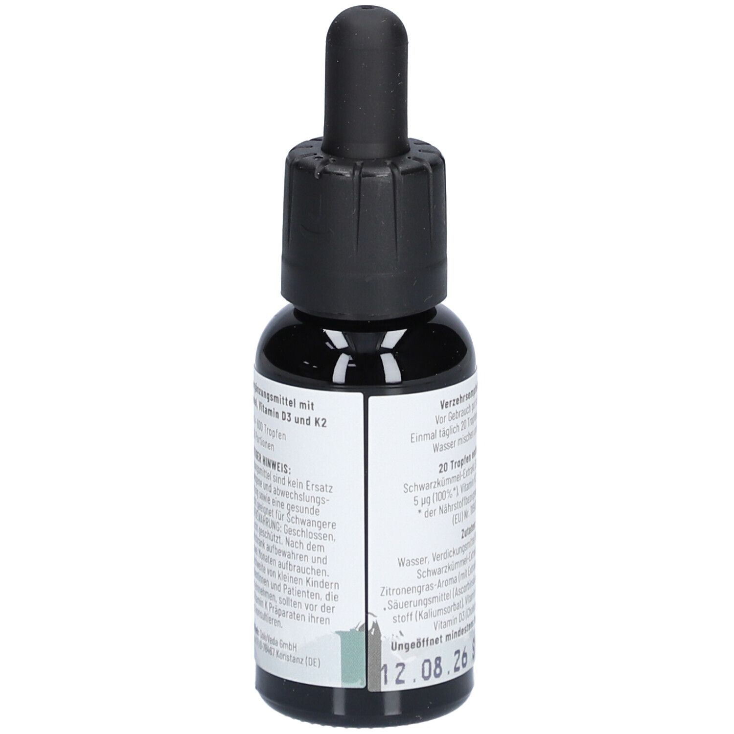 Flacon en verre brun avec compte-gouttes noir. Inscription : CANNSOL, Schwarzkümmel avec vitamine D3 et K2. Vegan. Texte au dos.