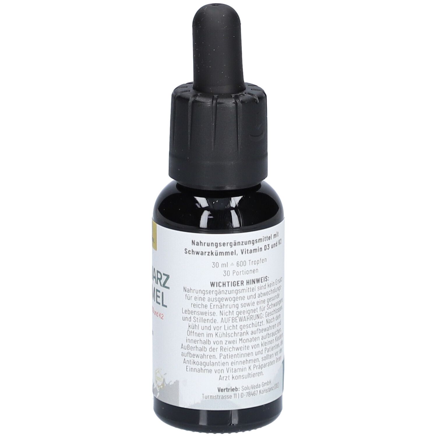 Flacon en verre brun avec compte-gouttes noir. Inscription : CANNSOL, Schwarzkümmel avec vitamine D3 et K2. Vegan. Texte au dos.