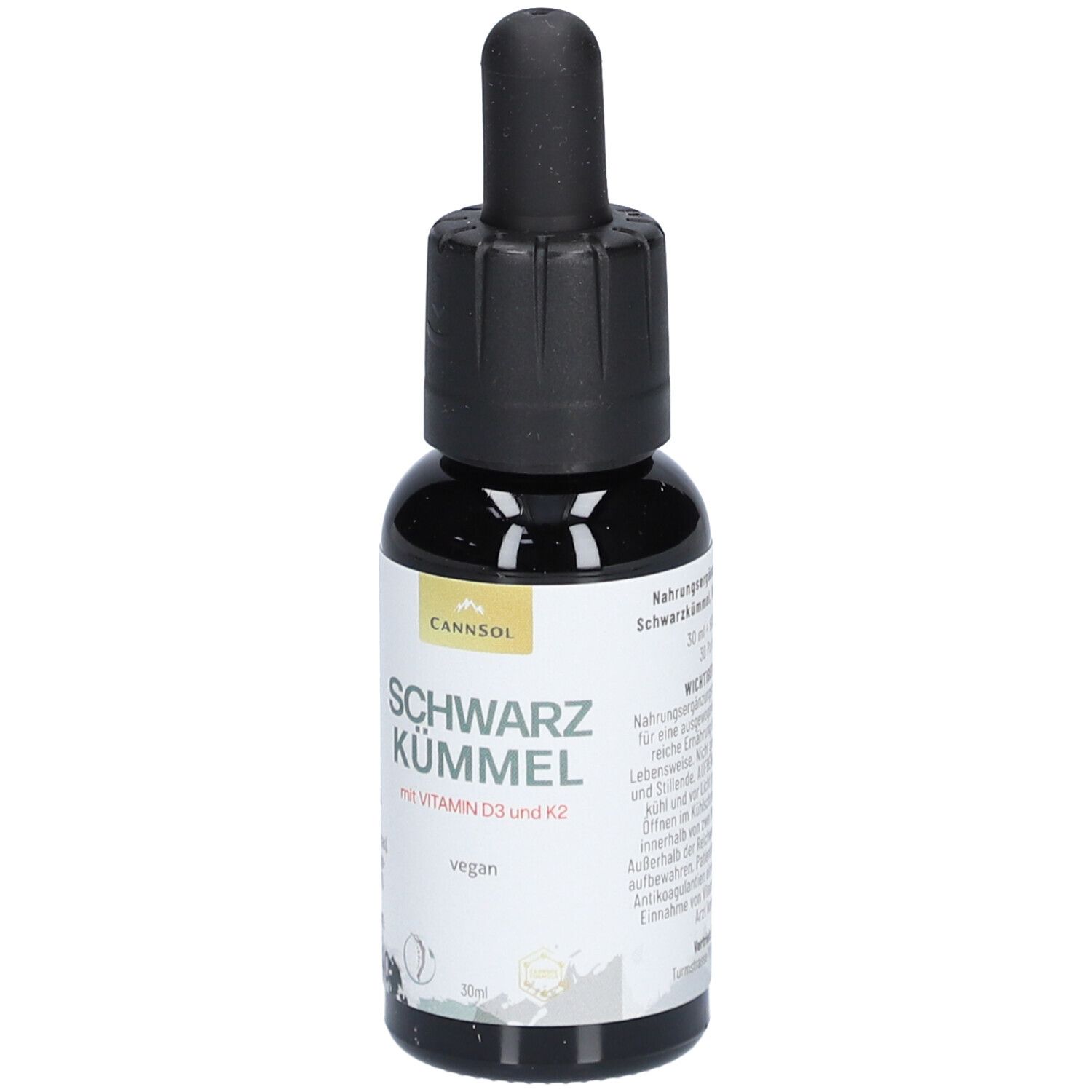 Flacon en verre brun avec compte-gouttes noir. Inscription : CANNSOL, Schwarzkümmel avec vitamine D3 et K2. Vegan.