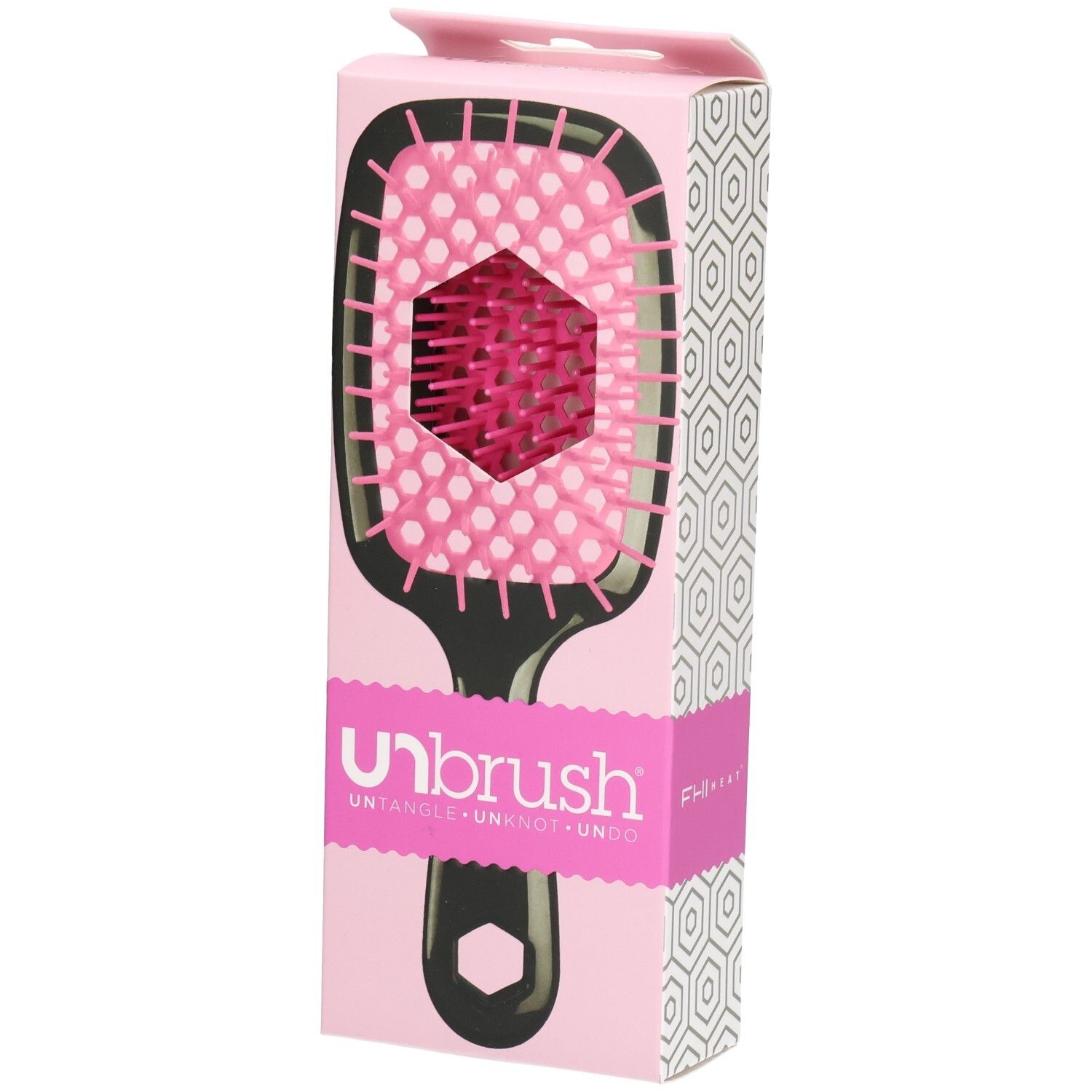 UNBRUSH Entwirrbürste in Verpackung. Schwarzer Griff, pinke Borsten. Pinke Verpackung mit Markenlogo.