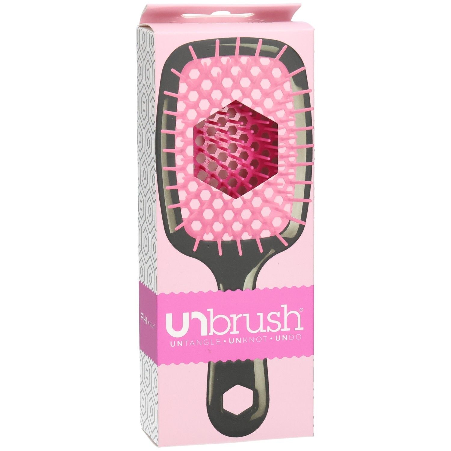 UNBRUSH Entwirrbürste in Verpackung. Schwarzer Griff, pinke Borsten. Pinke Verpackung mit Markenlogo.