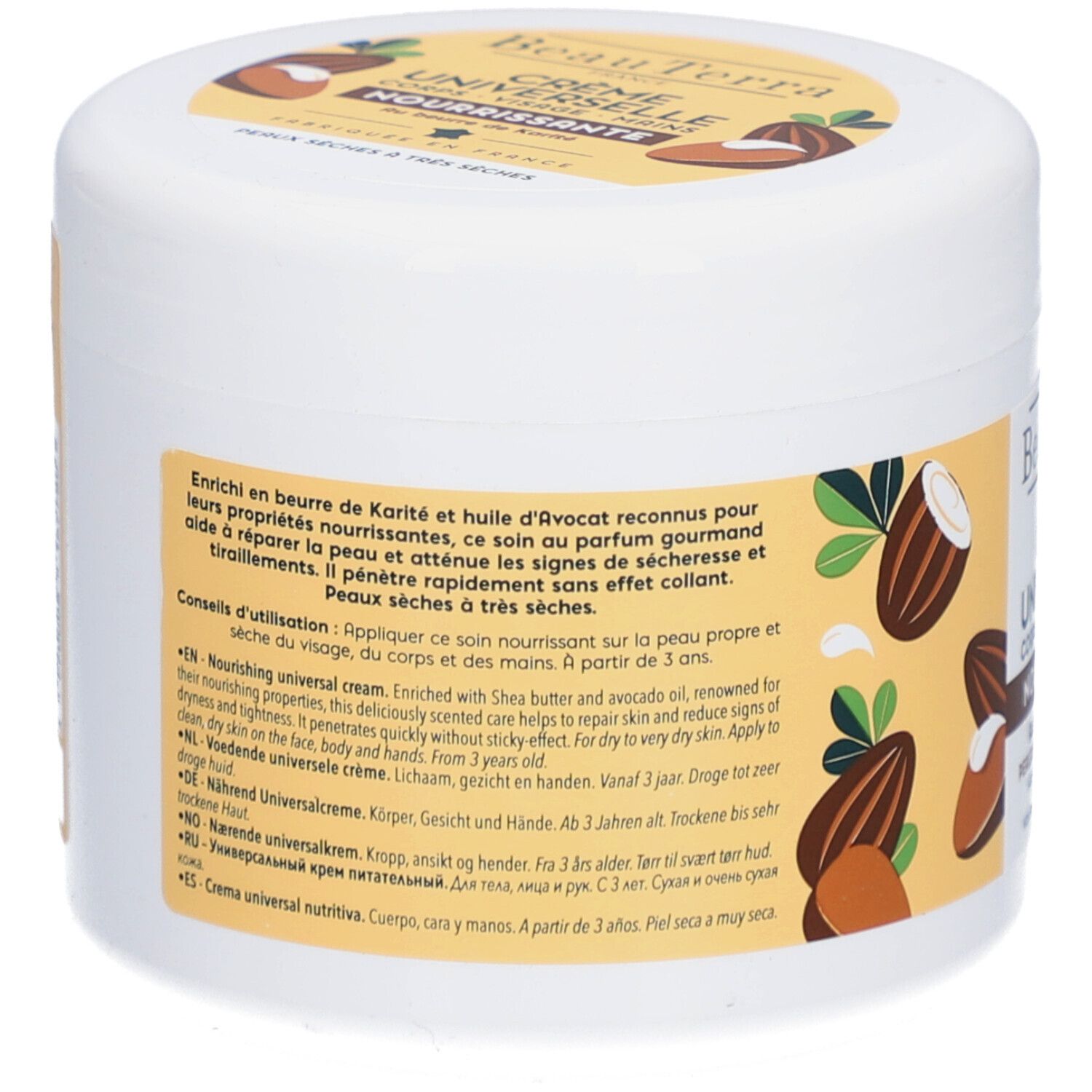 Dos du pot blanc. Texte en plusieurs langues. Contient du beurre de karité et de l'huile d'avocat. Pour peaux sèches à très sèches.