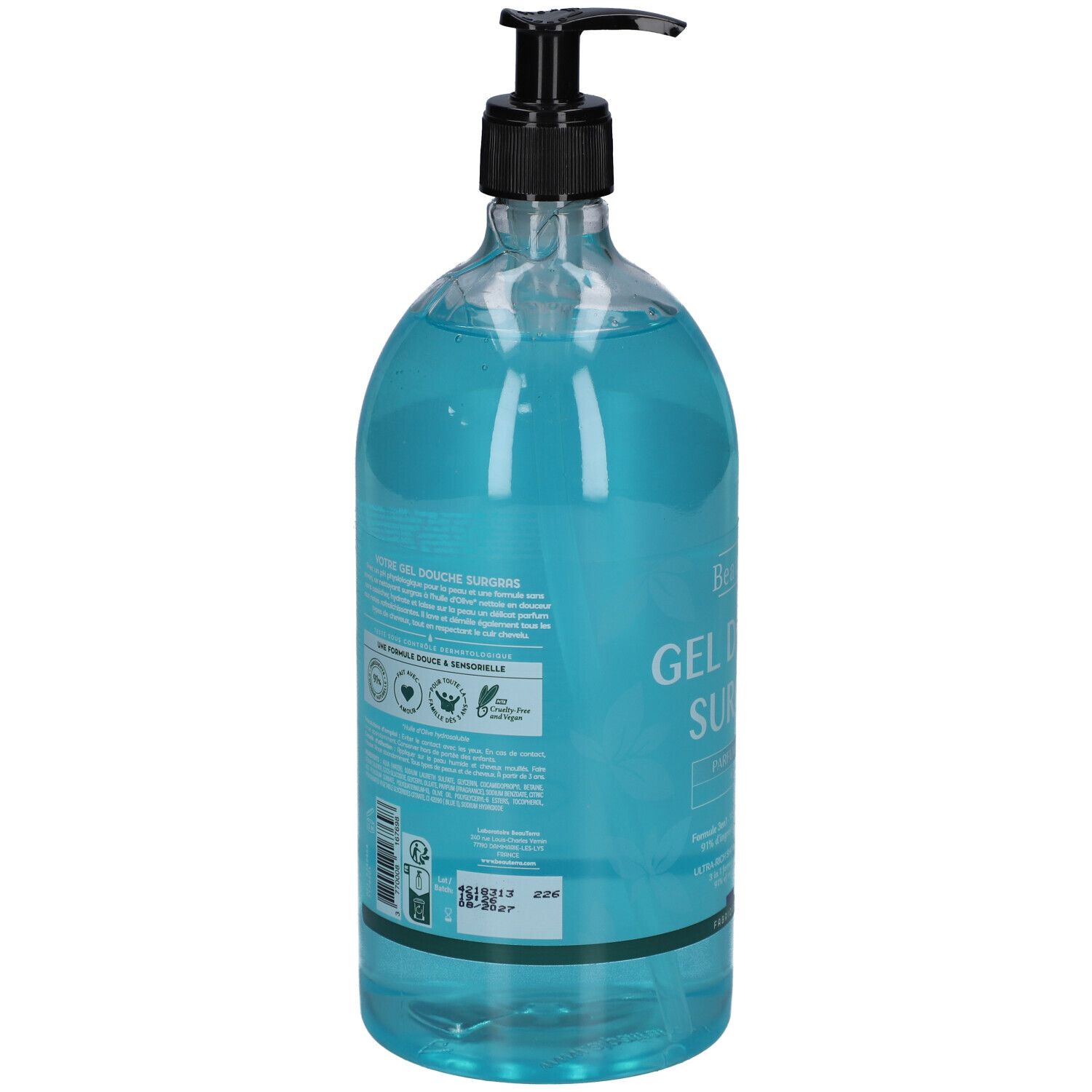 Rückseite der transparenten Flasche mit blauem Duschgel. Schwarzer Spender. Text und Logos.