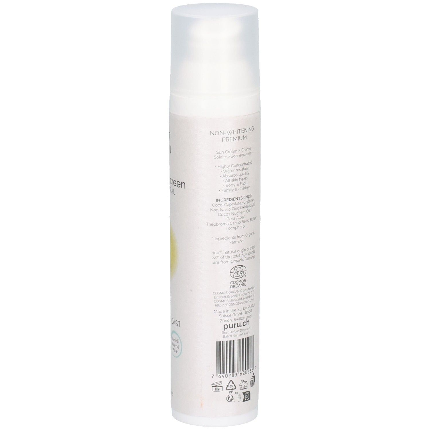 Weisse Flasche mit Text. Aufschrift: Non-whitening Premium. Text in mehreren Sprachen. Rückseite der Sonnencreme.