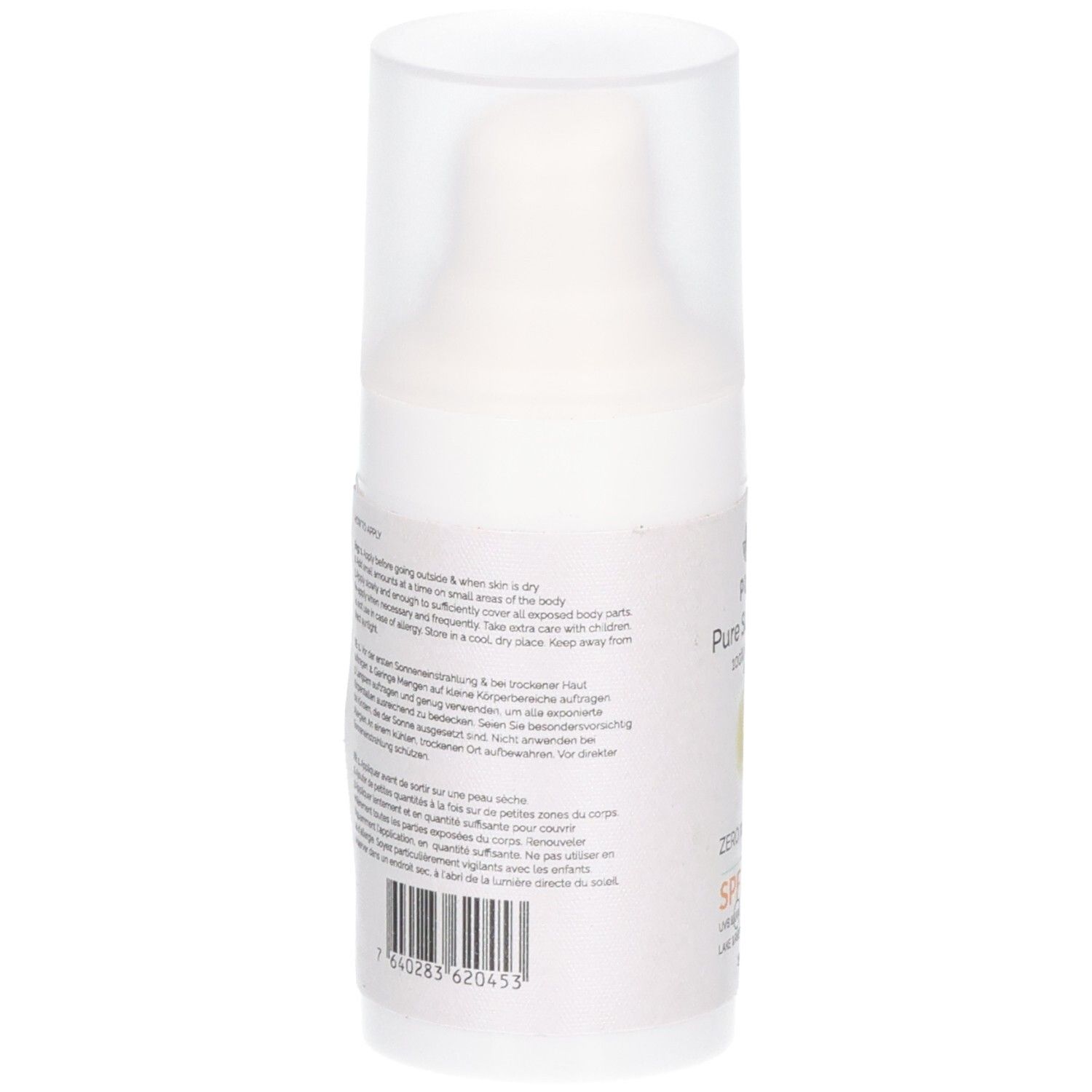 Rückansicht der weißen Sonnencreme-Flasche. Text auf dem Etikett. Barcode unten. Transparenter Deckel.