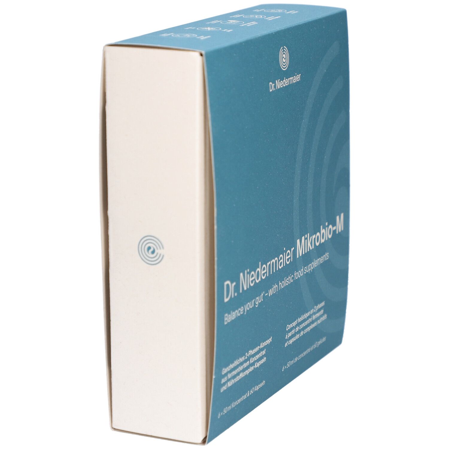 Blaue Schachtel, Produktname Dr. Niedermaier Mikrobio-M. Text: Balance your gut. Seitenansicht, weißer Rand.