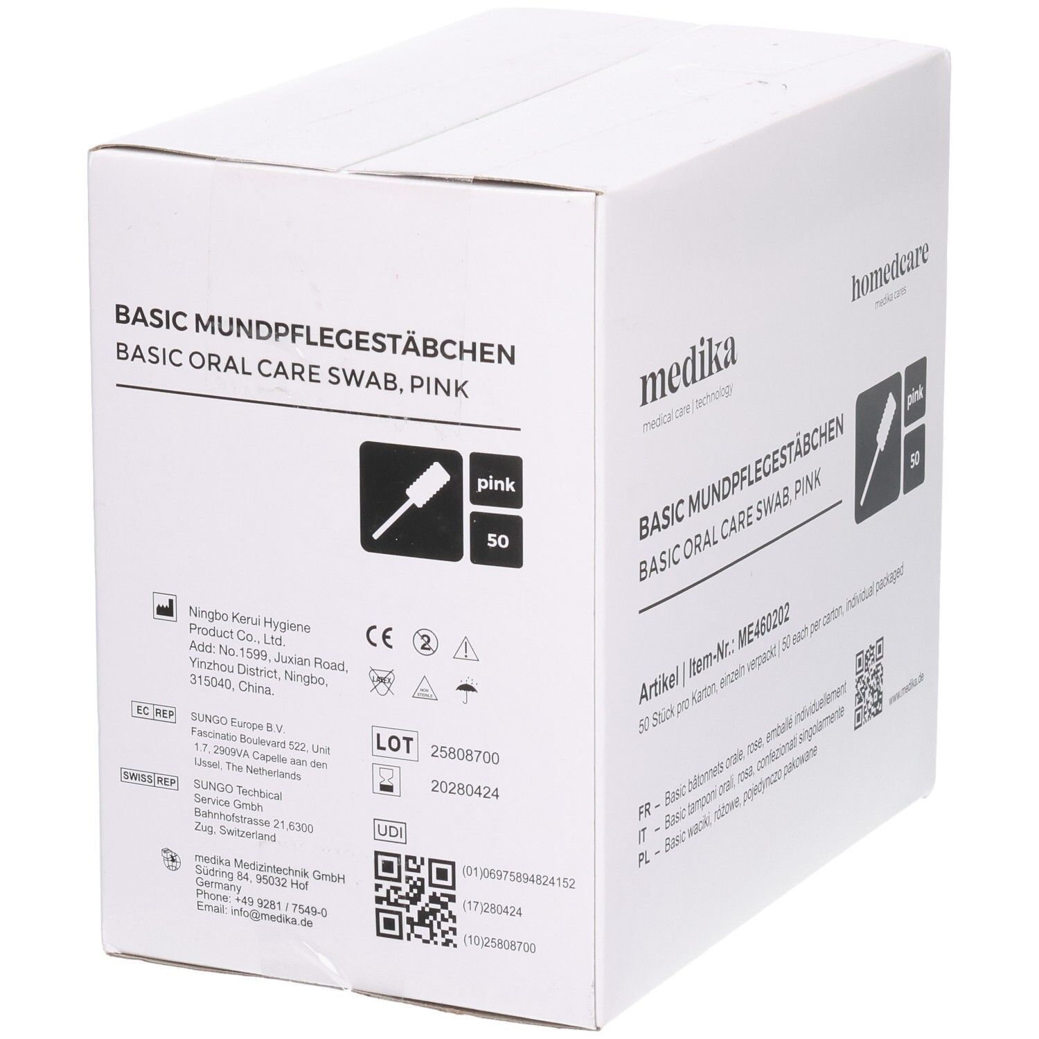 Weißer Karton mit Produktaufdruck. Aufschrift: BASIC MUNDPFLEGESTÄBCHEN, BASIC ORAL CARE SWAB, PINK. Enthält 50 Stück. Mit CE-Kennzeichnung.