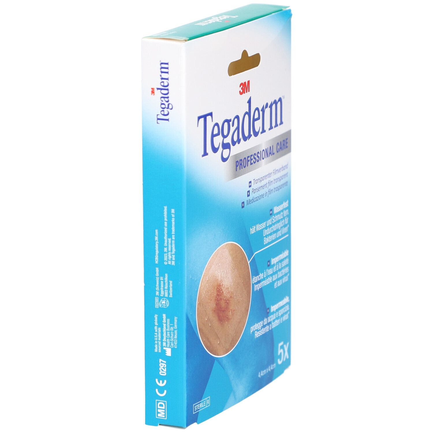 3M Tegaderm Verpackung. Aufdruck: Transparentes Folienverband, wasserfest, 5 Stück, 4,4 cm x 4,4 cm. Sichtbar: Wundauflage.